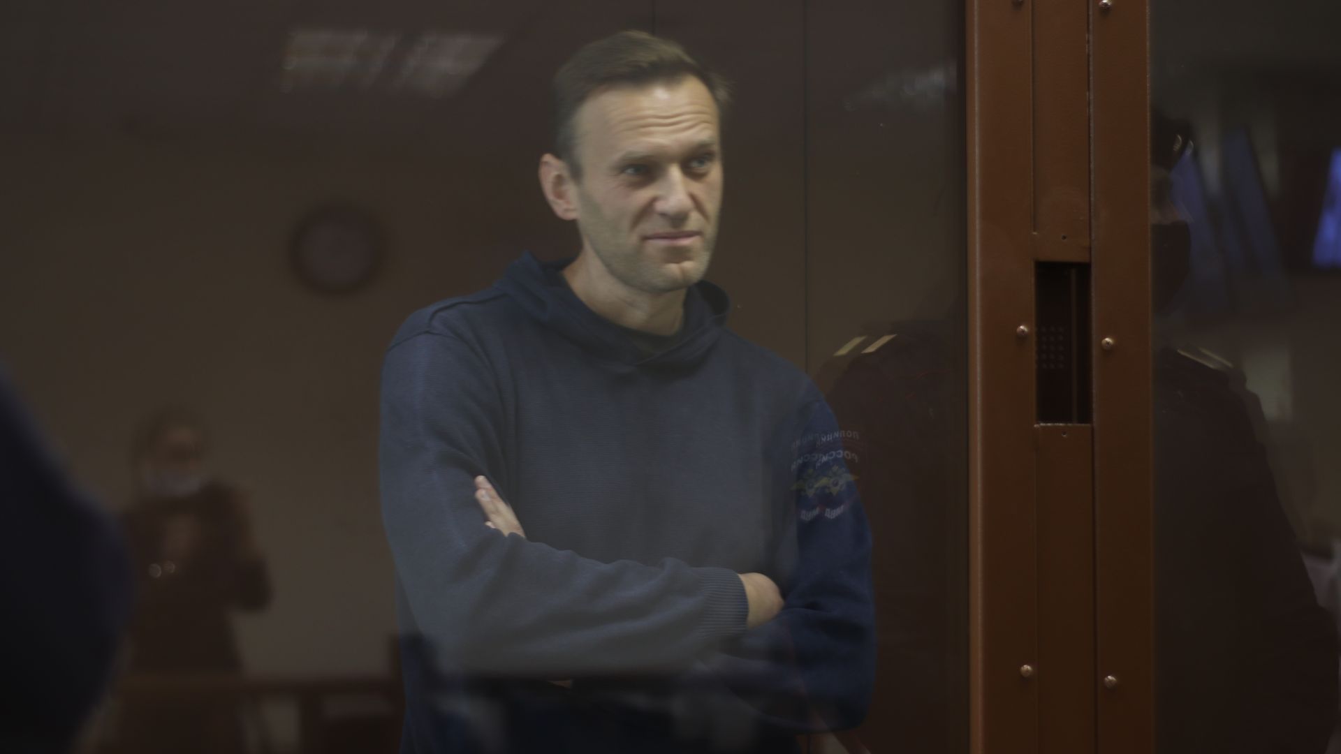 Alexei Navalny appears in court wearing a black hoodie