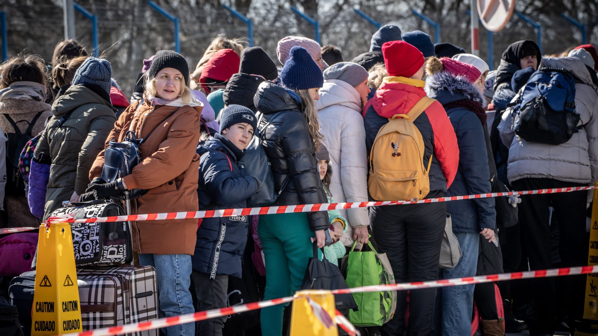 Refugees from Ukraine wait at the border crossing in Palanca.