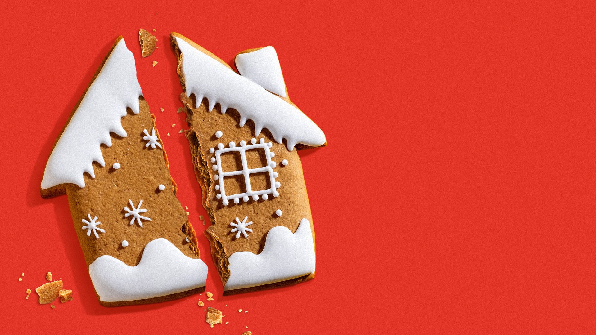 Illustration of a gingerbread house cookie broken in half.