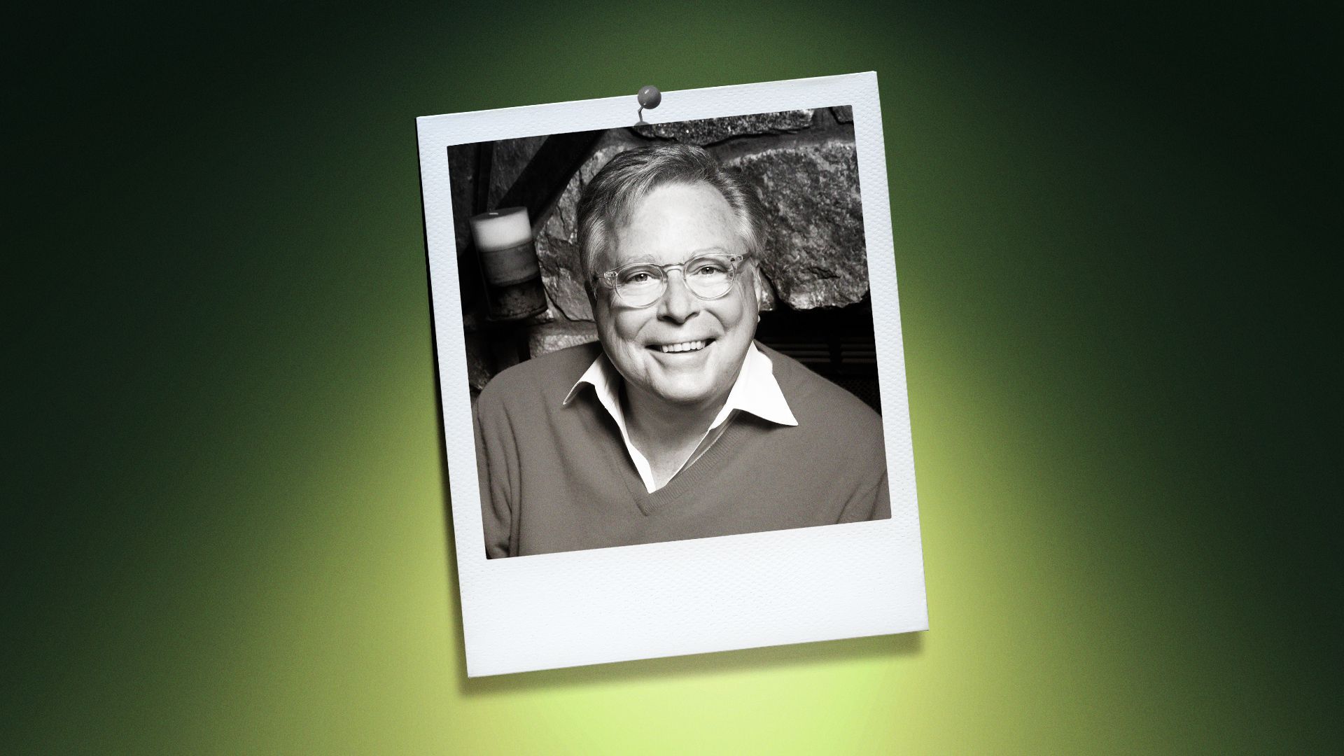 Photo illustration of Ira David Wood III in the center of a Polaroid photo under a green spotlight.