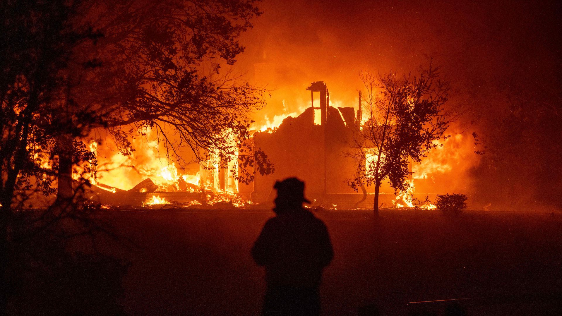 A home burns in Vacaville, California during the LNU Lightning Complex fire, as fires burn across Northern California on Aug. 19. 