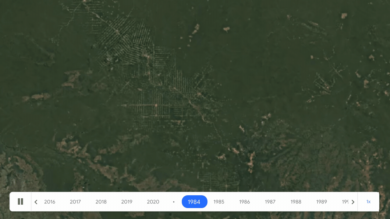 Satellite photo showing green forest cover in Brazil gradually being replaced by agricultural lands.