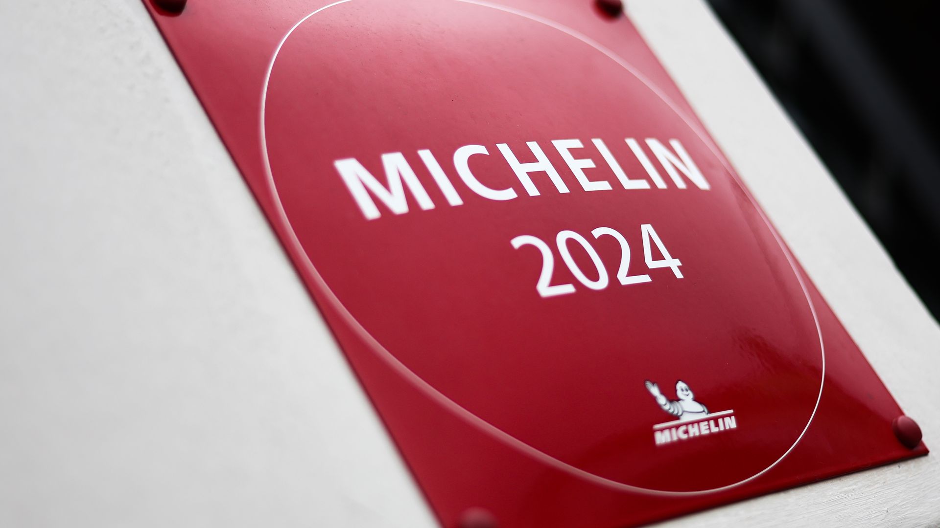 A red sign that says Michelin 2024.