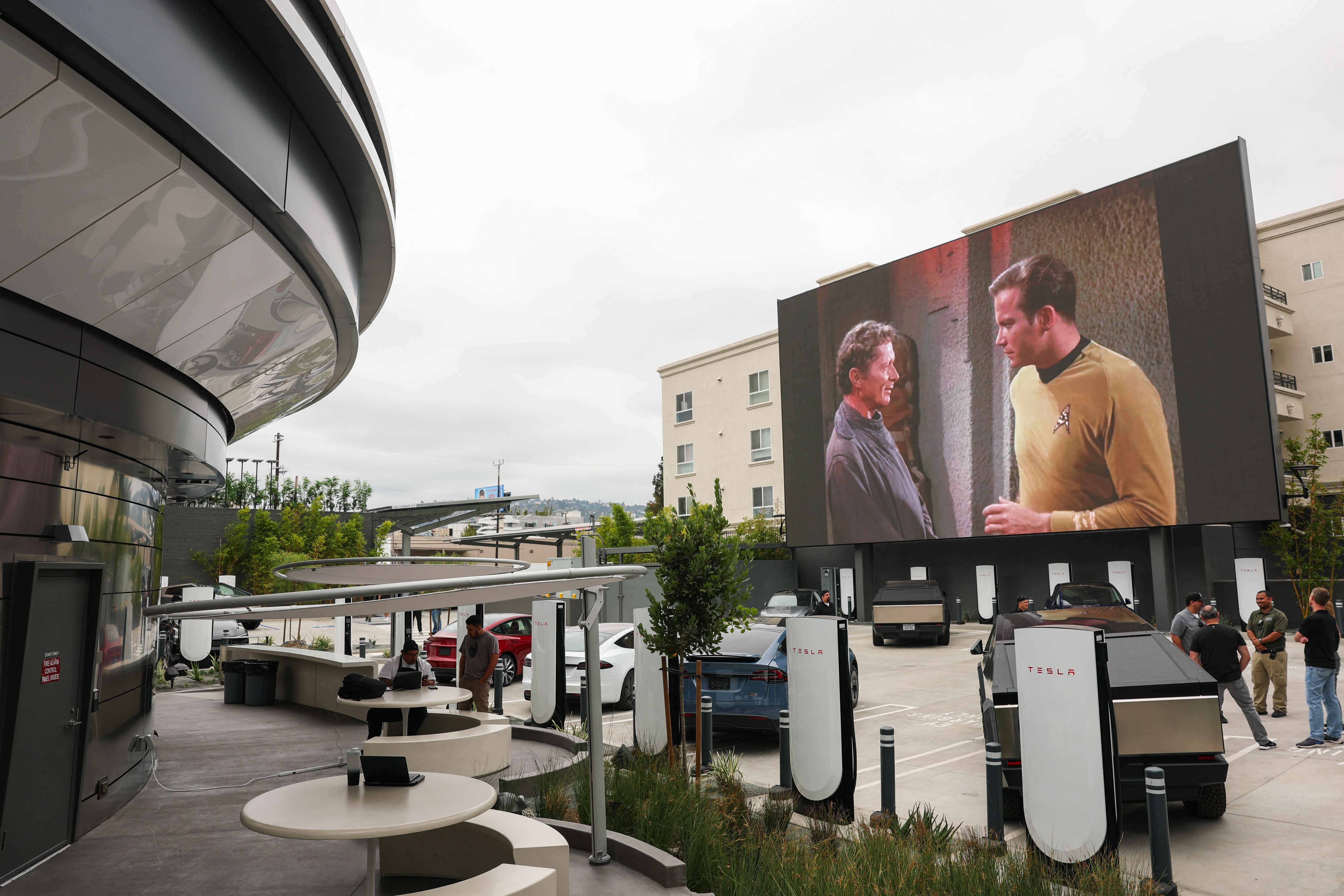 A giant screen plays a "Star Trek" movie ahead of the opening of Tesla's diner in Los Angeles yesterday.