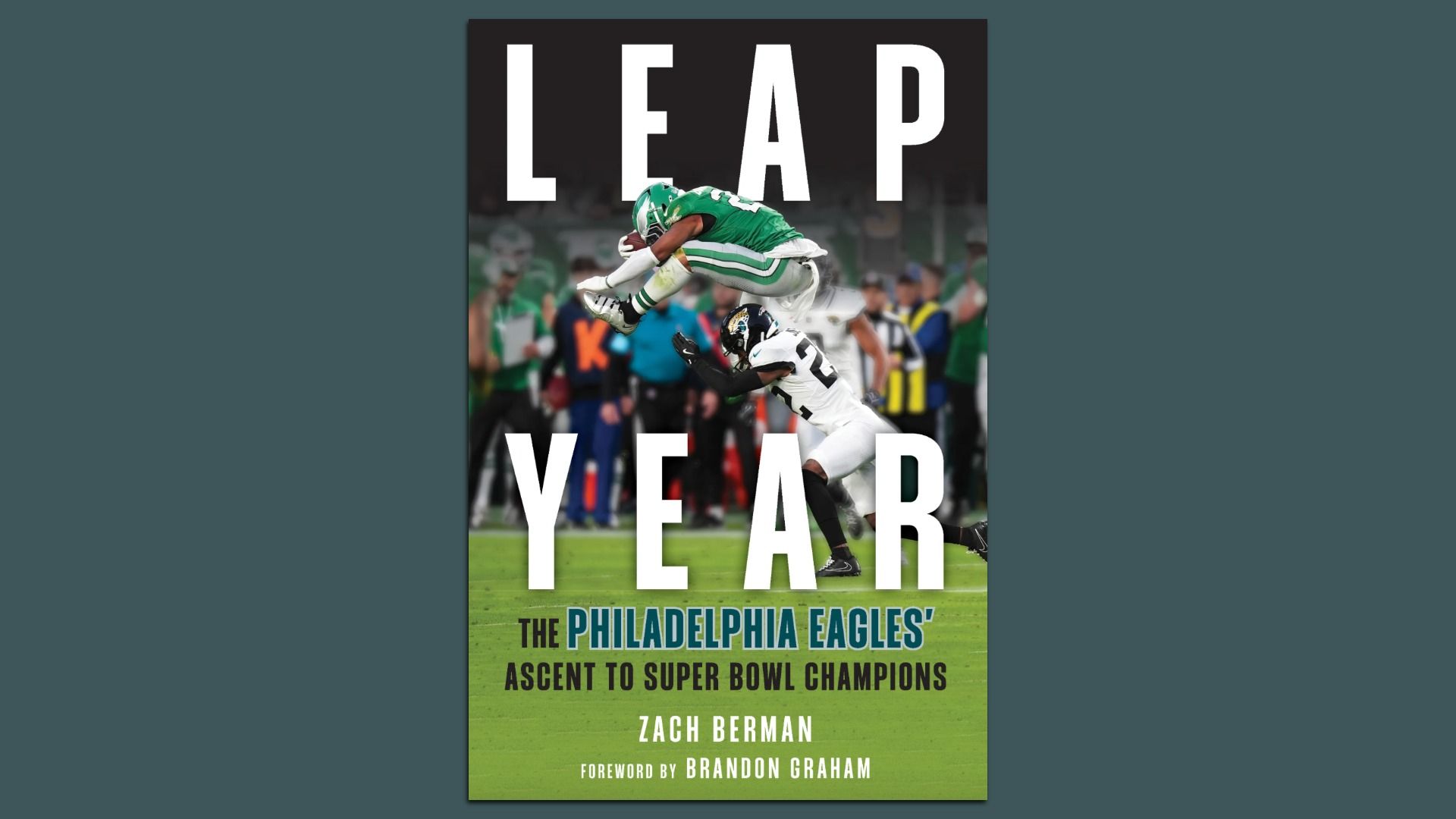 The front cover of the "Leap Year" book, with Saquon Barkley's iconic jump.