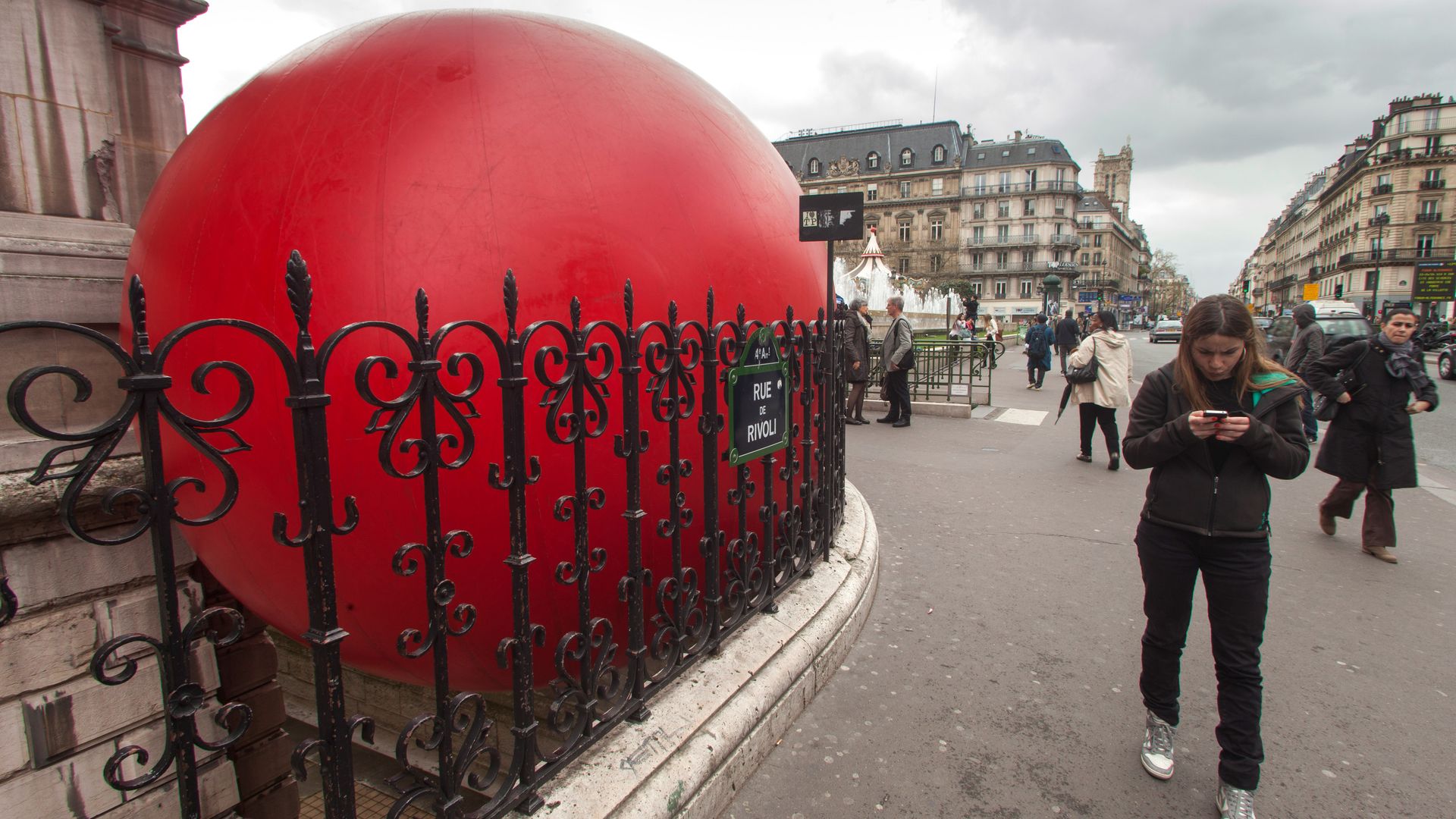 American artist Kurt Perschke's installation 'RedBall Project' is seen at Hotel De Ville on April 19, 2013 in Paris, France. The RedBall Project has been exhibited in various cities around the world and is currently appearing In Paris. (Photo by Laurent Emmanuel/Getty Images)