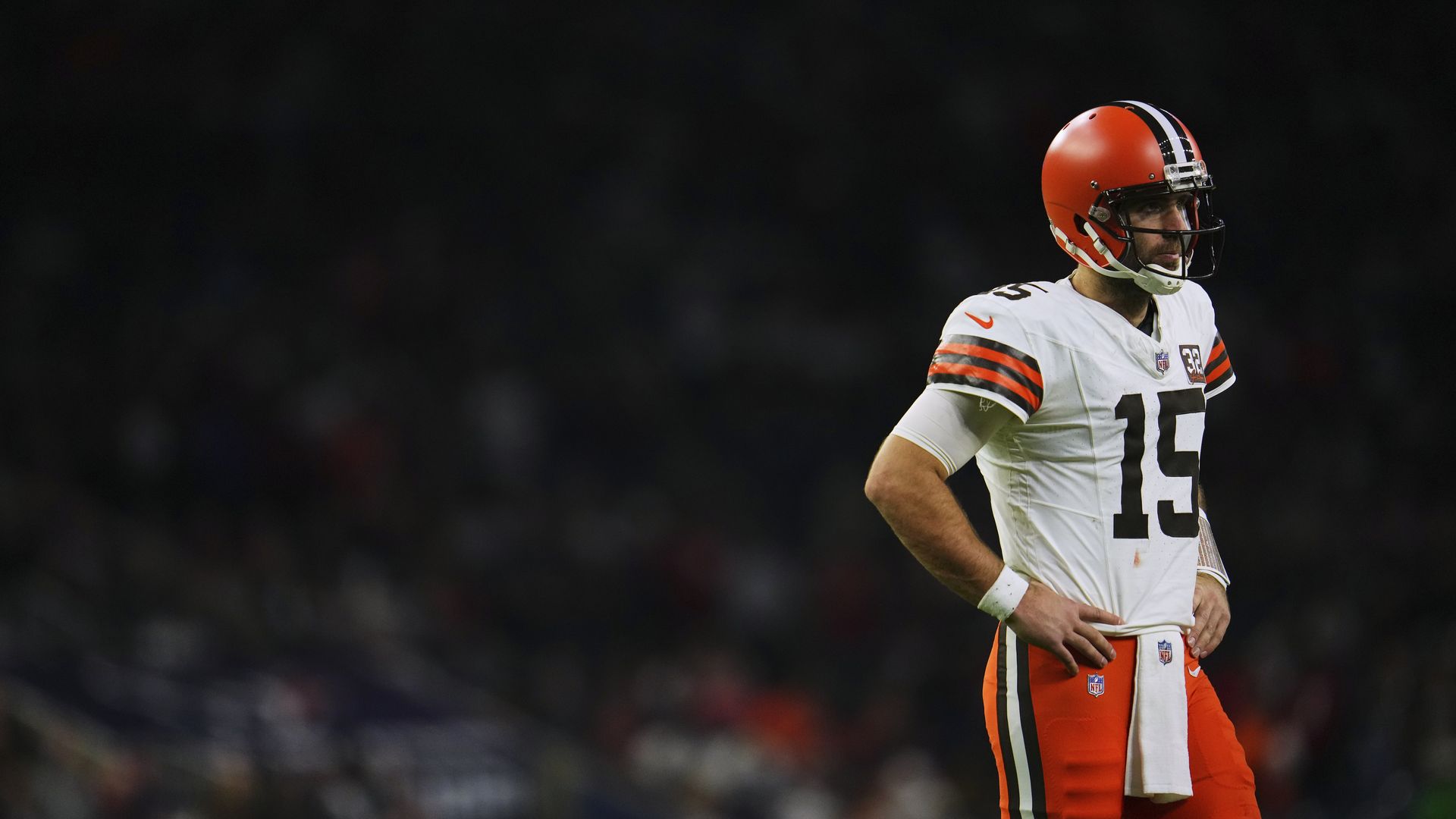 Joe Flacco of the Browns stands on the field with his hands on his hips. 