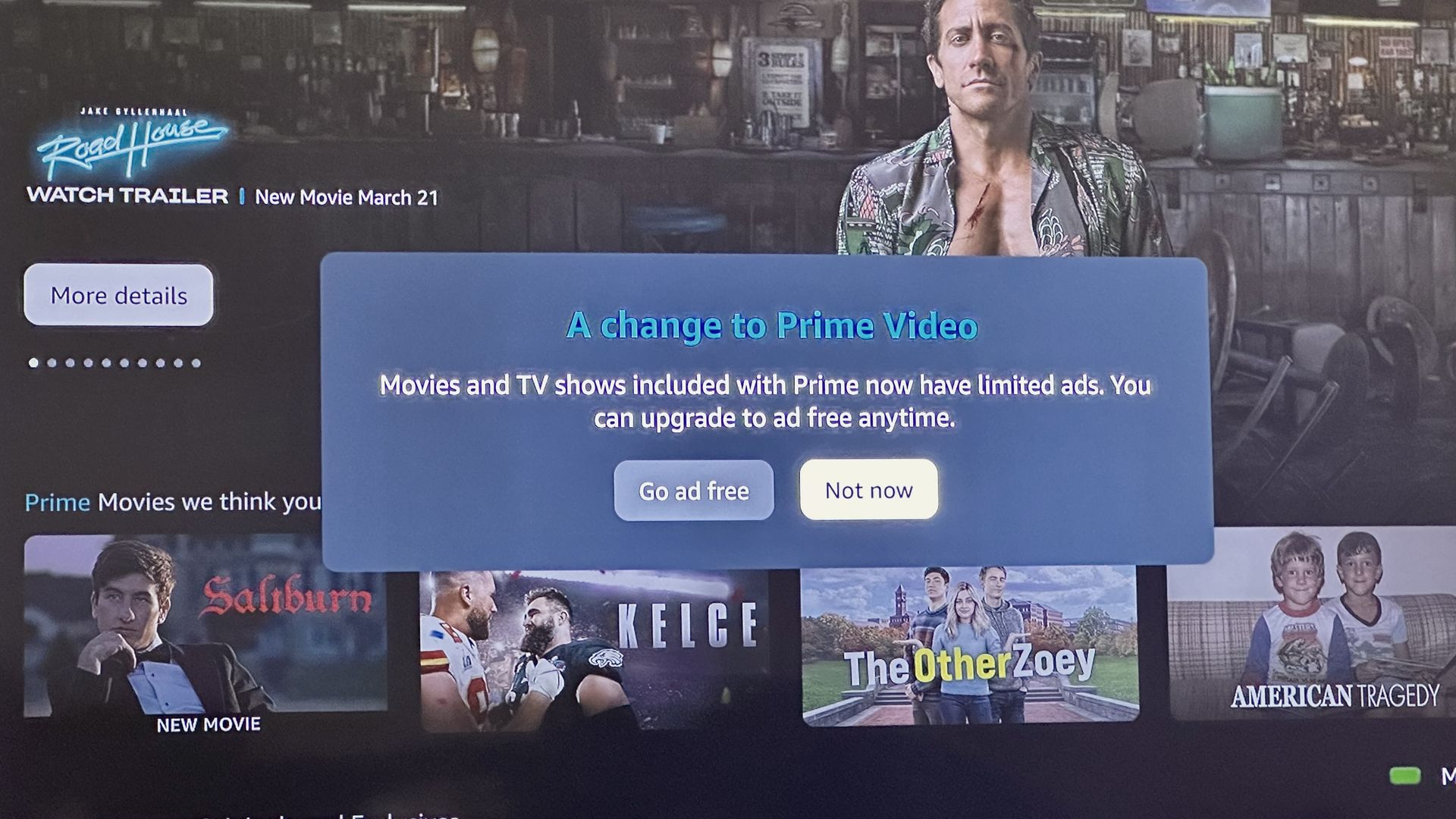 A television screen with Amazon Prime Video app open with a message that says movies and TV shows included with Prime now have limited ads with the option to upgrade to an ad-free tier. 