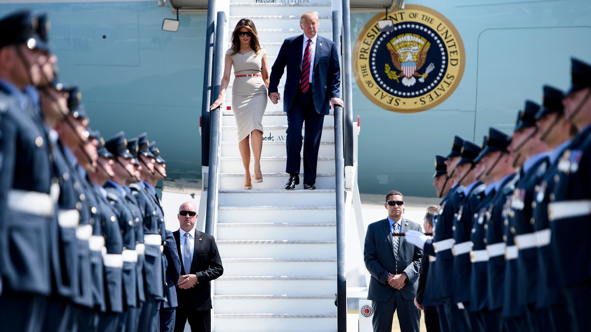 Trump and Melania disembark Air Force One
