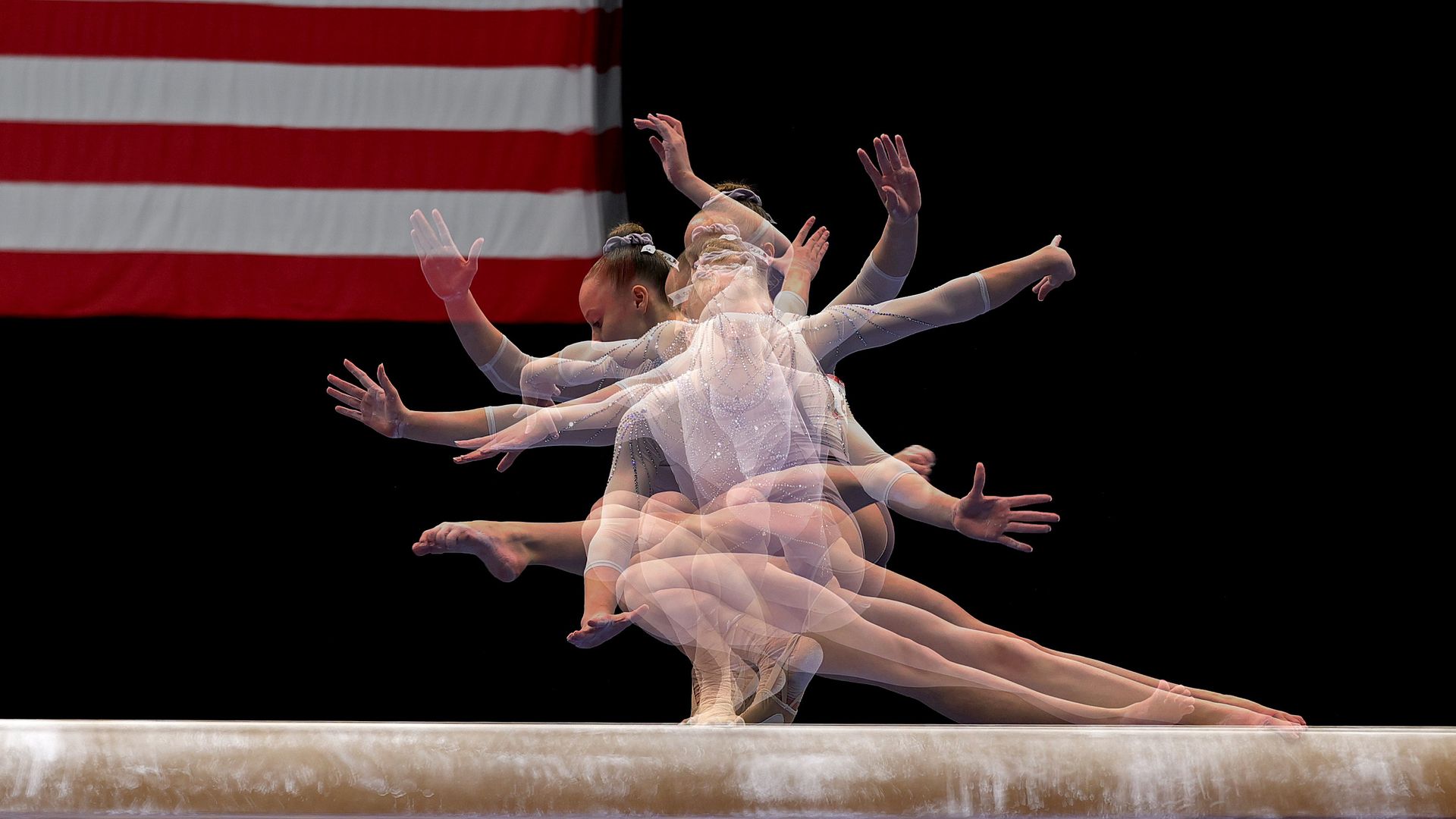 Nola Matthews competes on the balance beam in a magical photo that plays with time and space.
