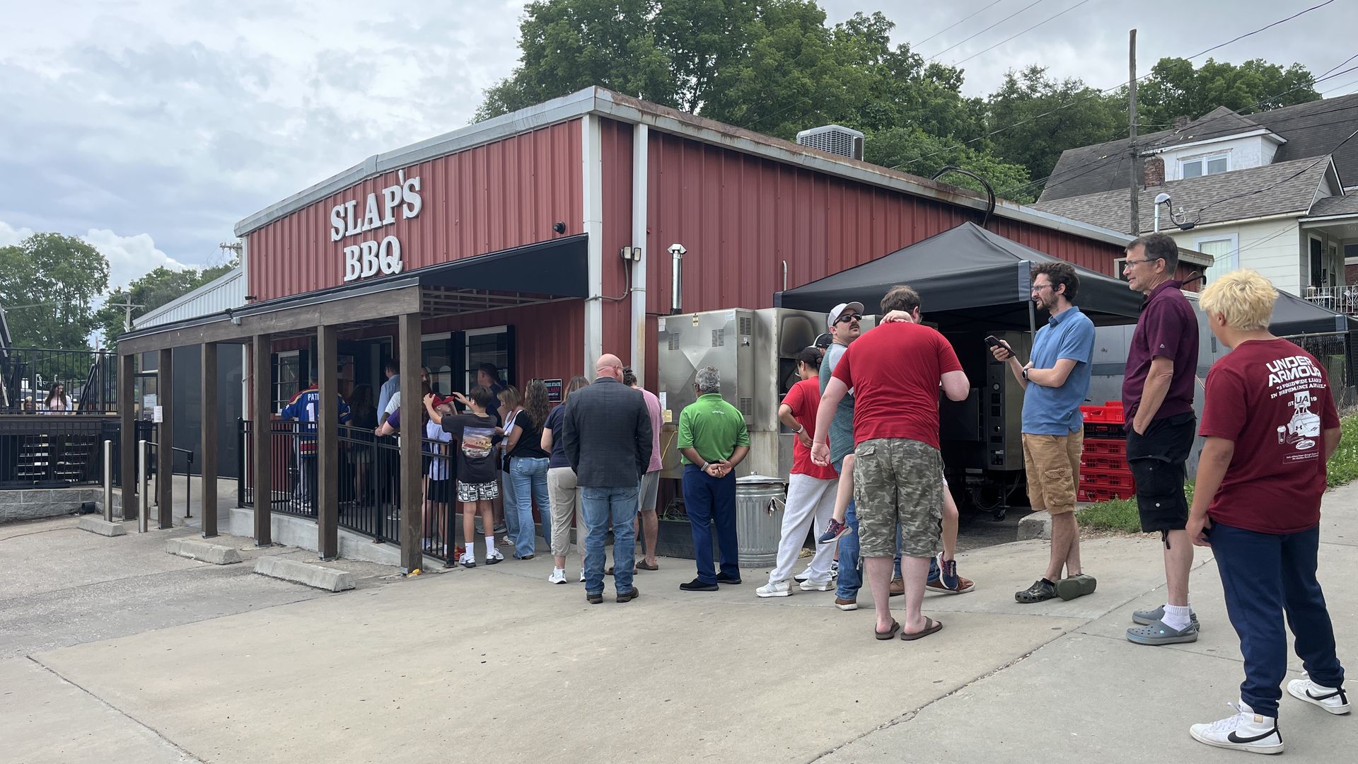 A line is formed outside of Slap's BBQ in Kansas City, Kansas.