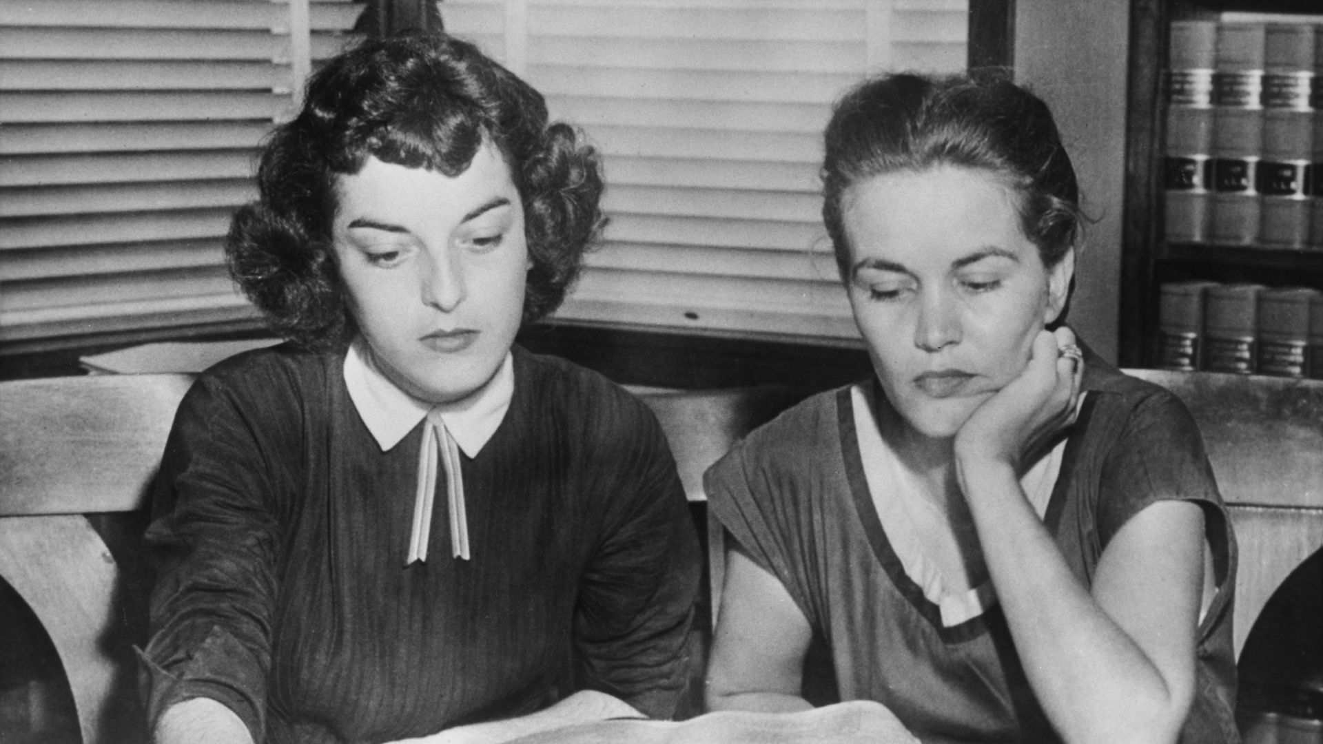 Carolyn Bryant and Juanita Milam (1927-2014), the wives of Roy Bryant and John William Milam, who stand accused of the kidnap and murder of Emmett Till, sitting in their husbands' lawyer’s office in Sumner, Mississippi, September 1955.
