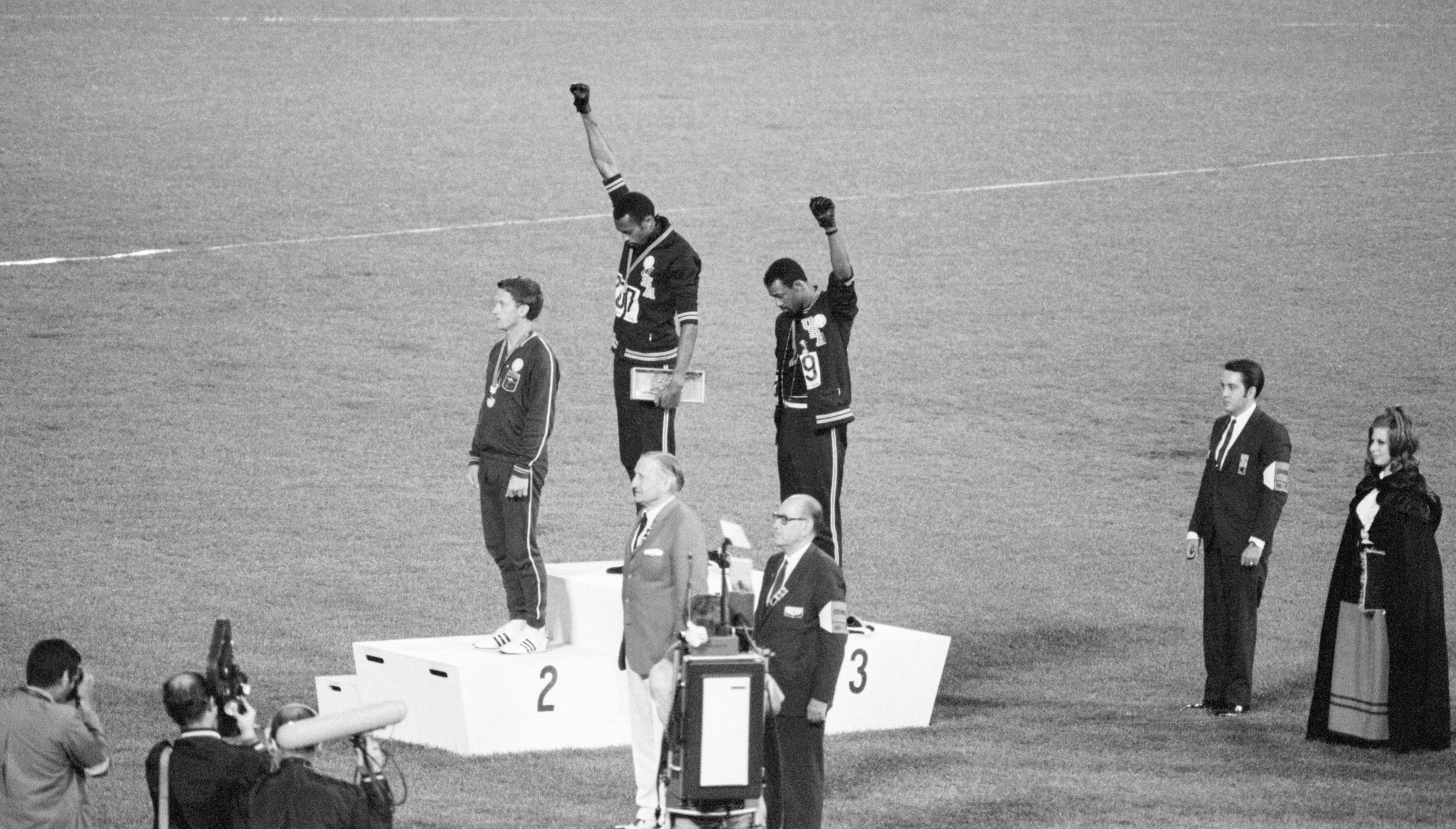 tommie smith and john carlos 1968 olympics raising fists
