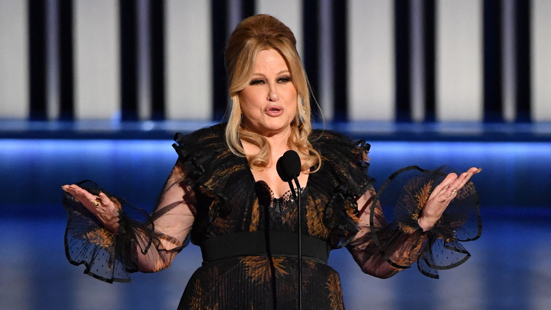 Photo shows Jennifer Coolidge on stage