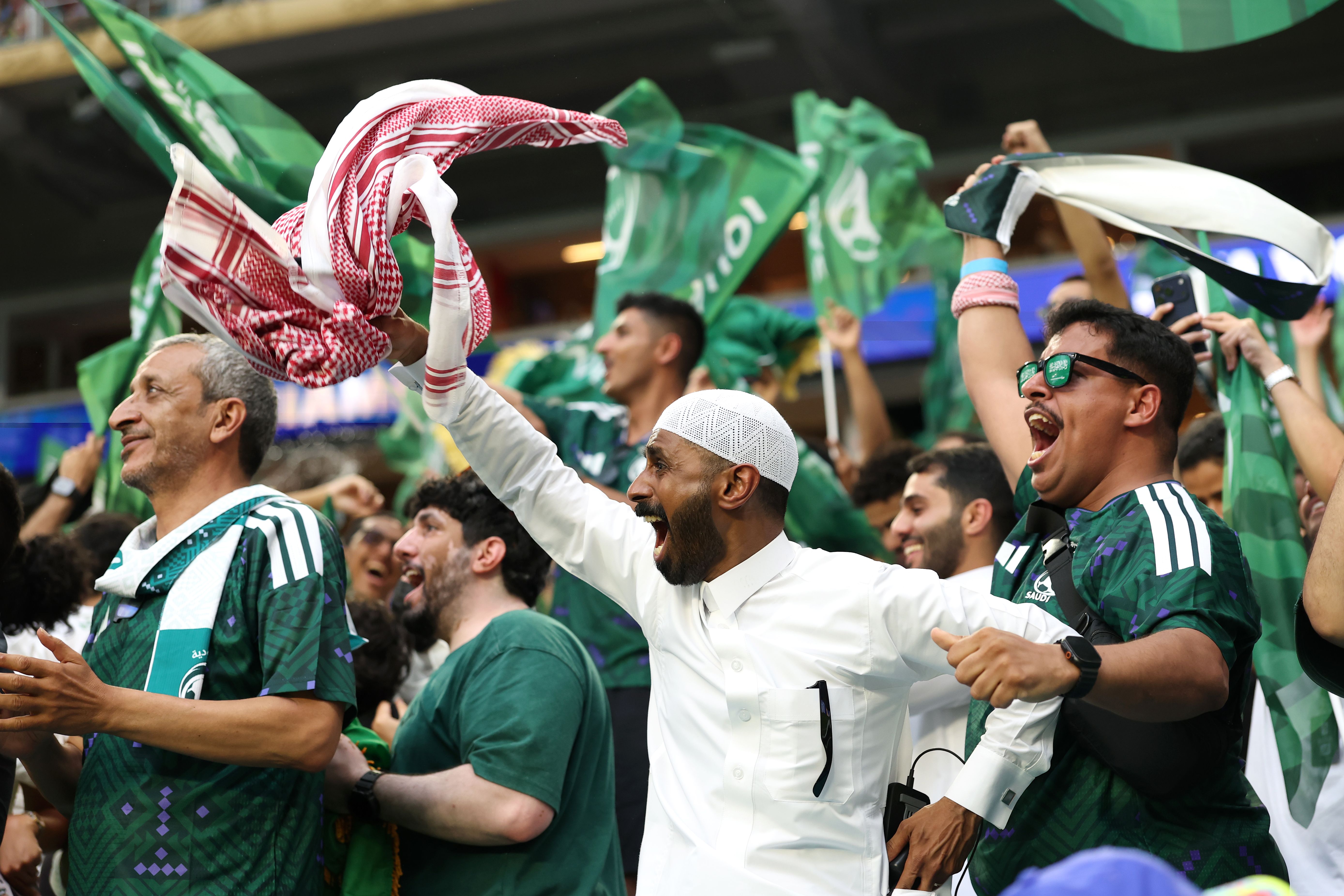 Saudi Arabia fans celebrate a goal during last night's World Cup match against Uruguay. Photo: Julian Finney/FIFA via Getty Images