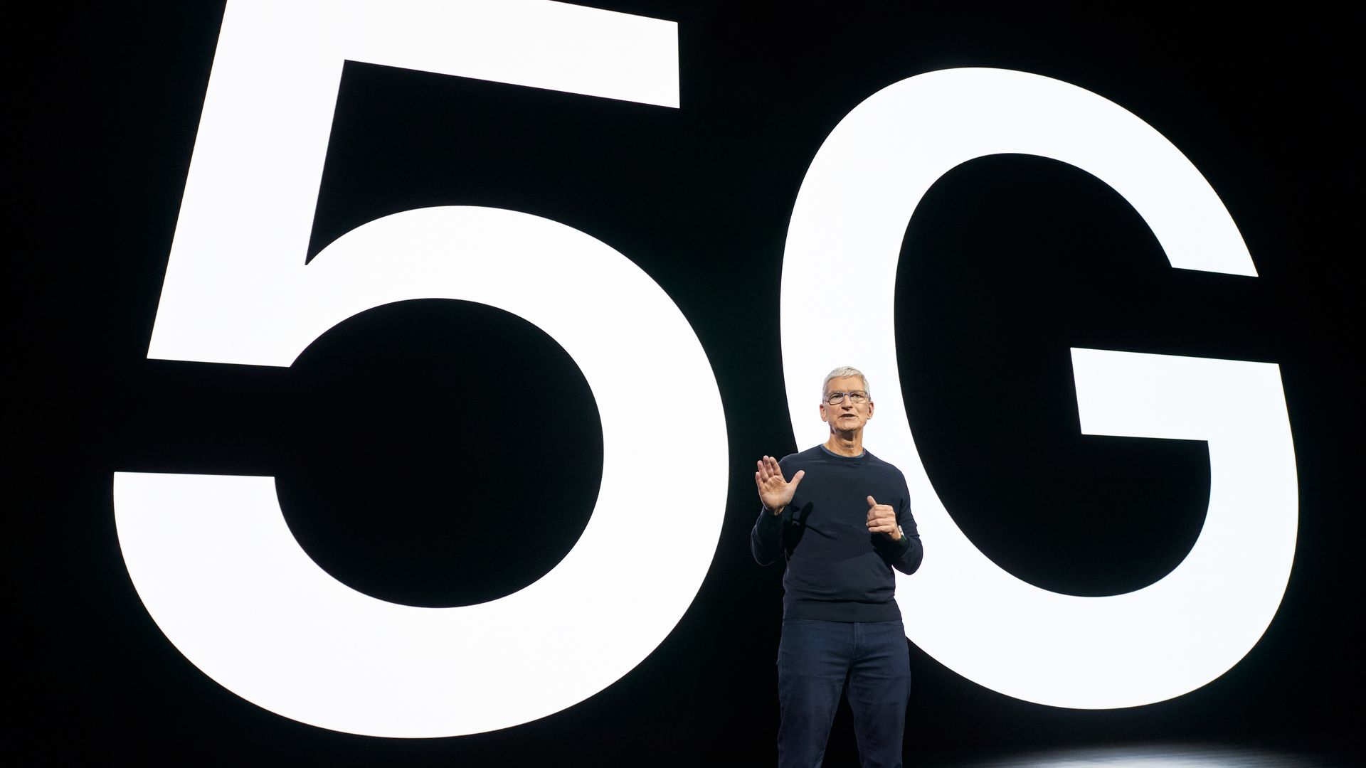 Apple CEO Tim Cook unveiling the 5G-capable iPhone 12 lineup