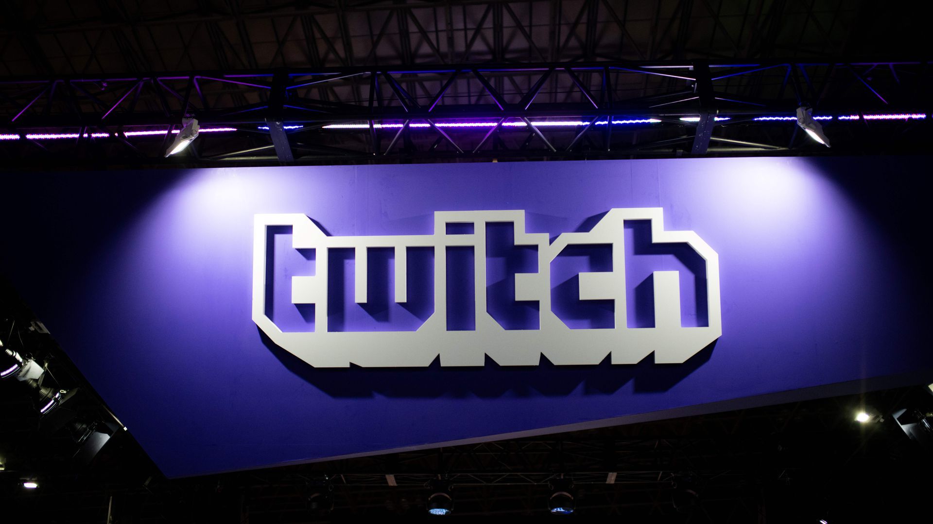 A large twitch logo in gray against a purple backgorund. 