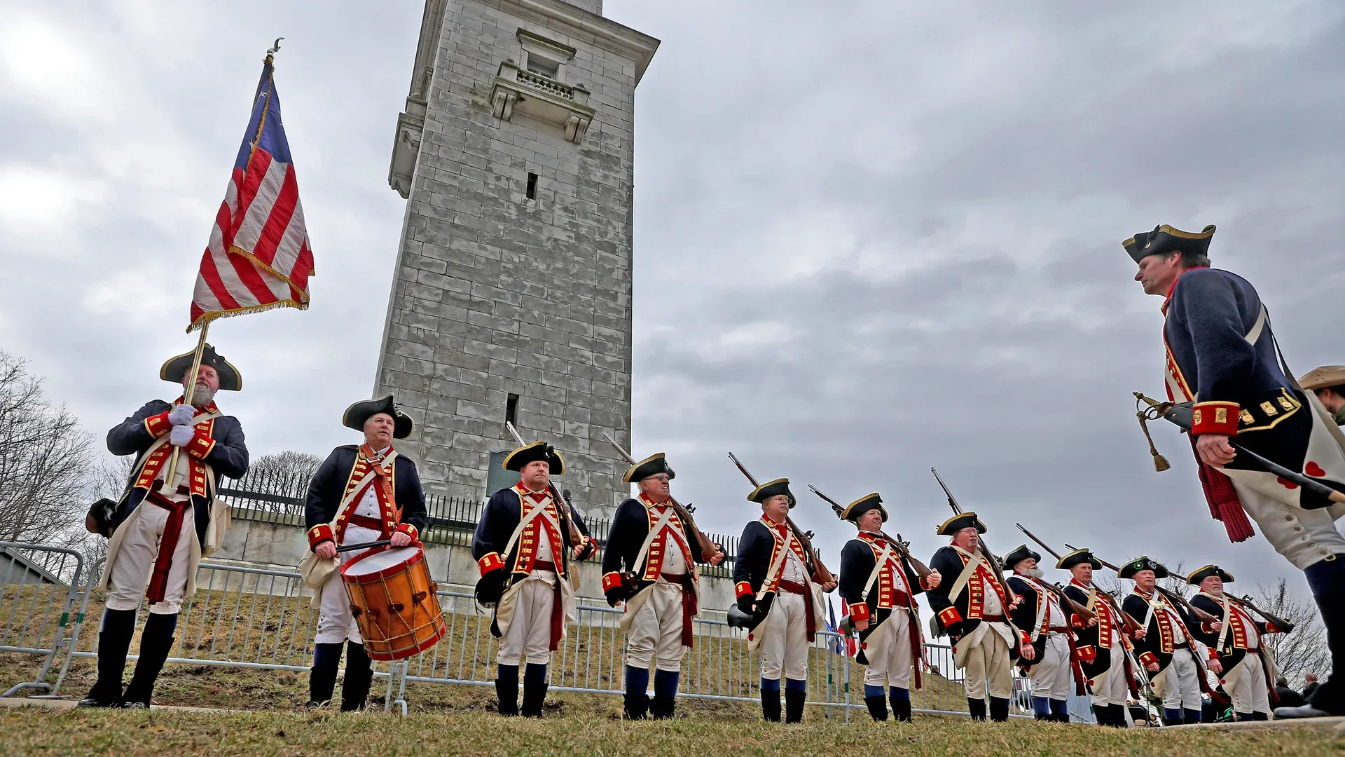 The Colonel Henry Knox Regimental Color Guard at attention on Dorchester Heights during the 2023 Evacuation Day festivities. Photo: Matt Stone/Boston Herald via Getty Images.

