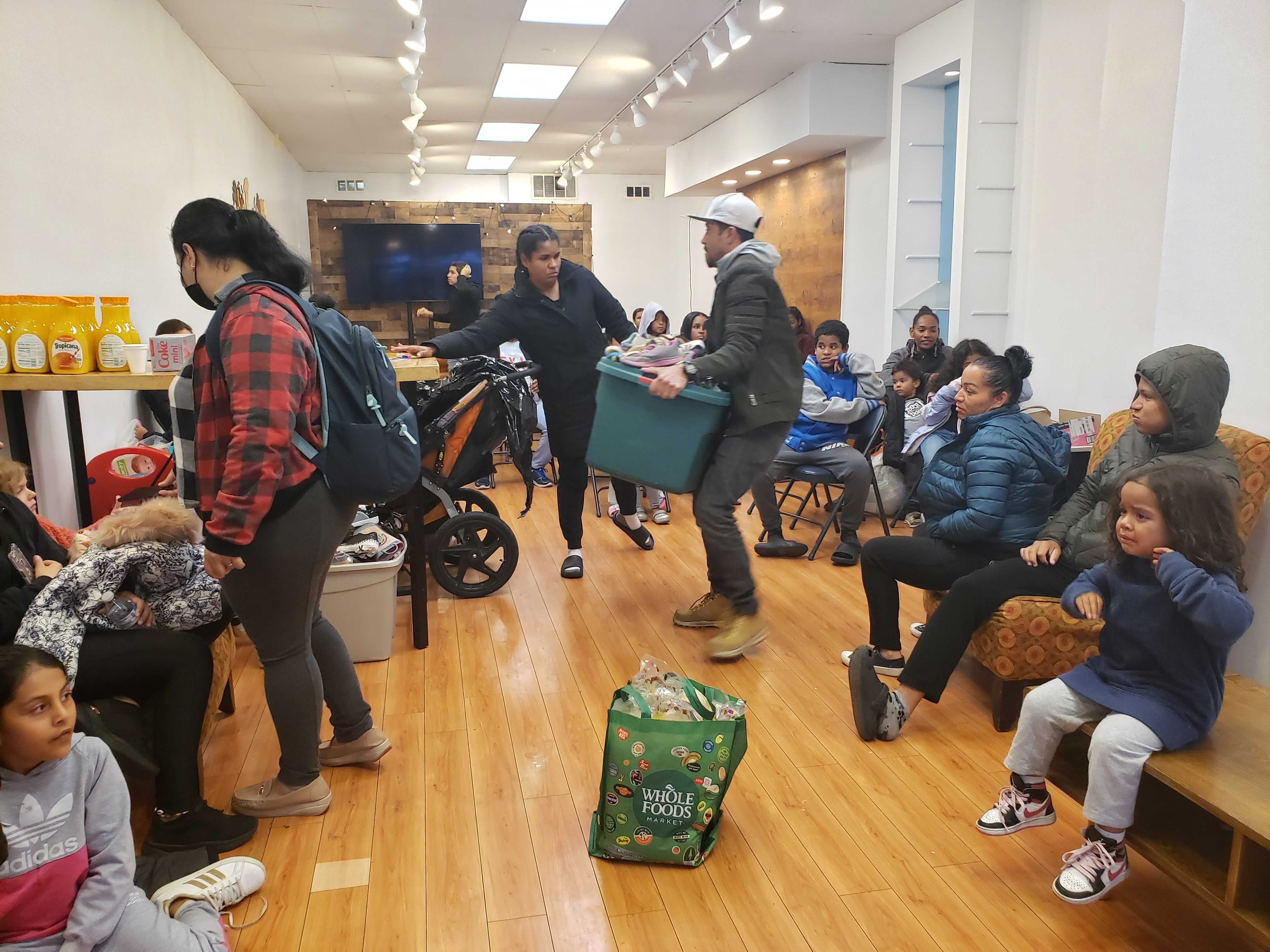 Photo of people waiting in line for clothes