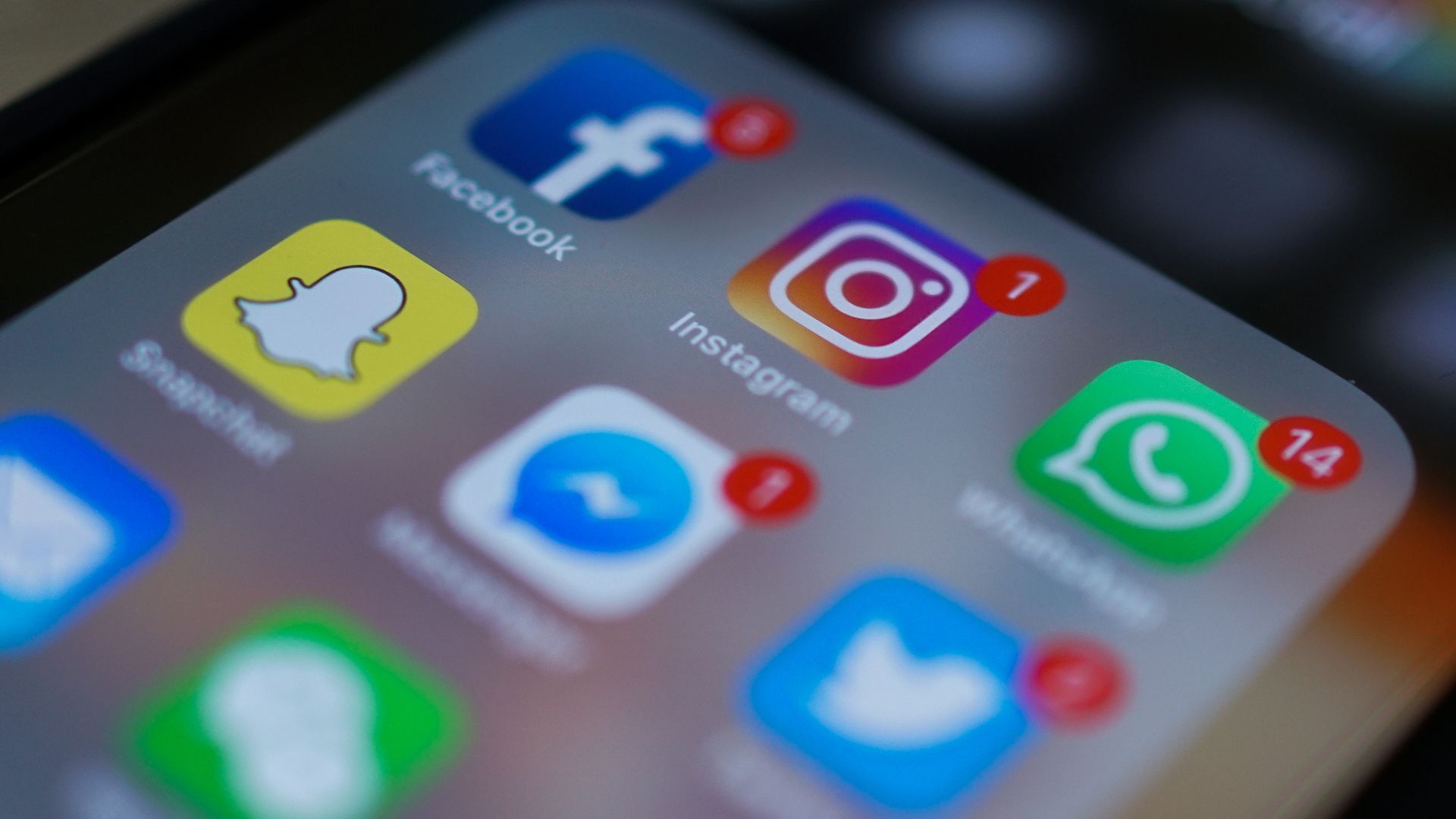 Photo of smartphone screen with social media app icons