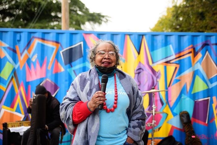 Mattie Marshall speaks at the ribbon cutting for The Ritz at Washington Heights.