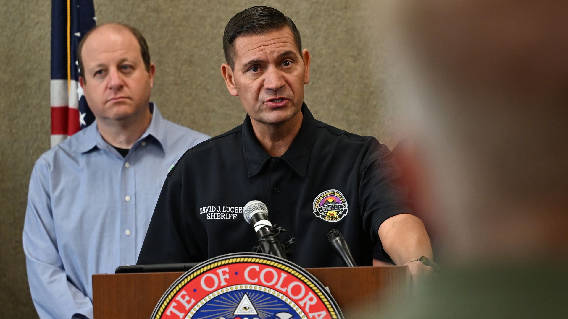 Gov. Jared Polis, left, and Pueblo County Sheriff David Lucero provide an update on the Aspen Acres Fire on July 2. Photo: RJ Sangosti/Denver Post via Getty Images