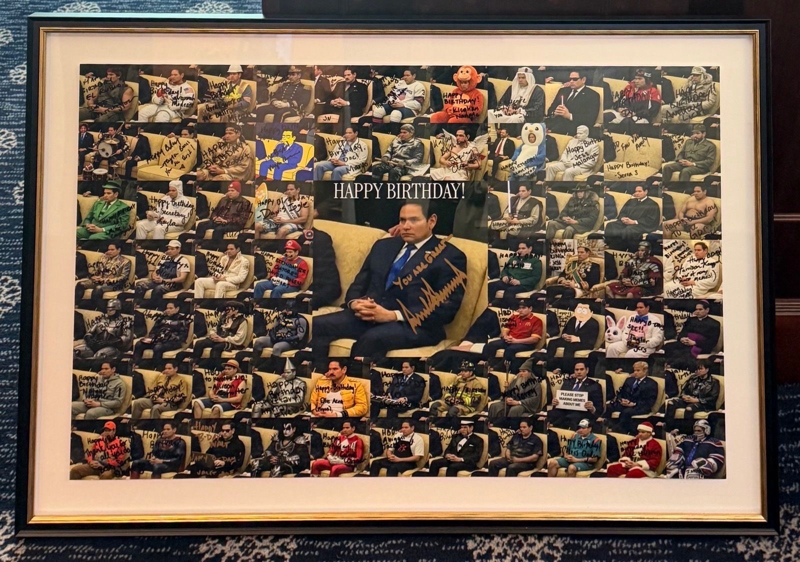 Framed collage photo showing a man in a navy suit seated center, surrounded by many small signed portraits of people in a theater; large "HAPPY BIRTHDAY!" banner across the middle.