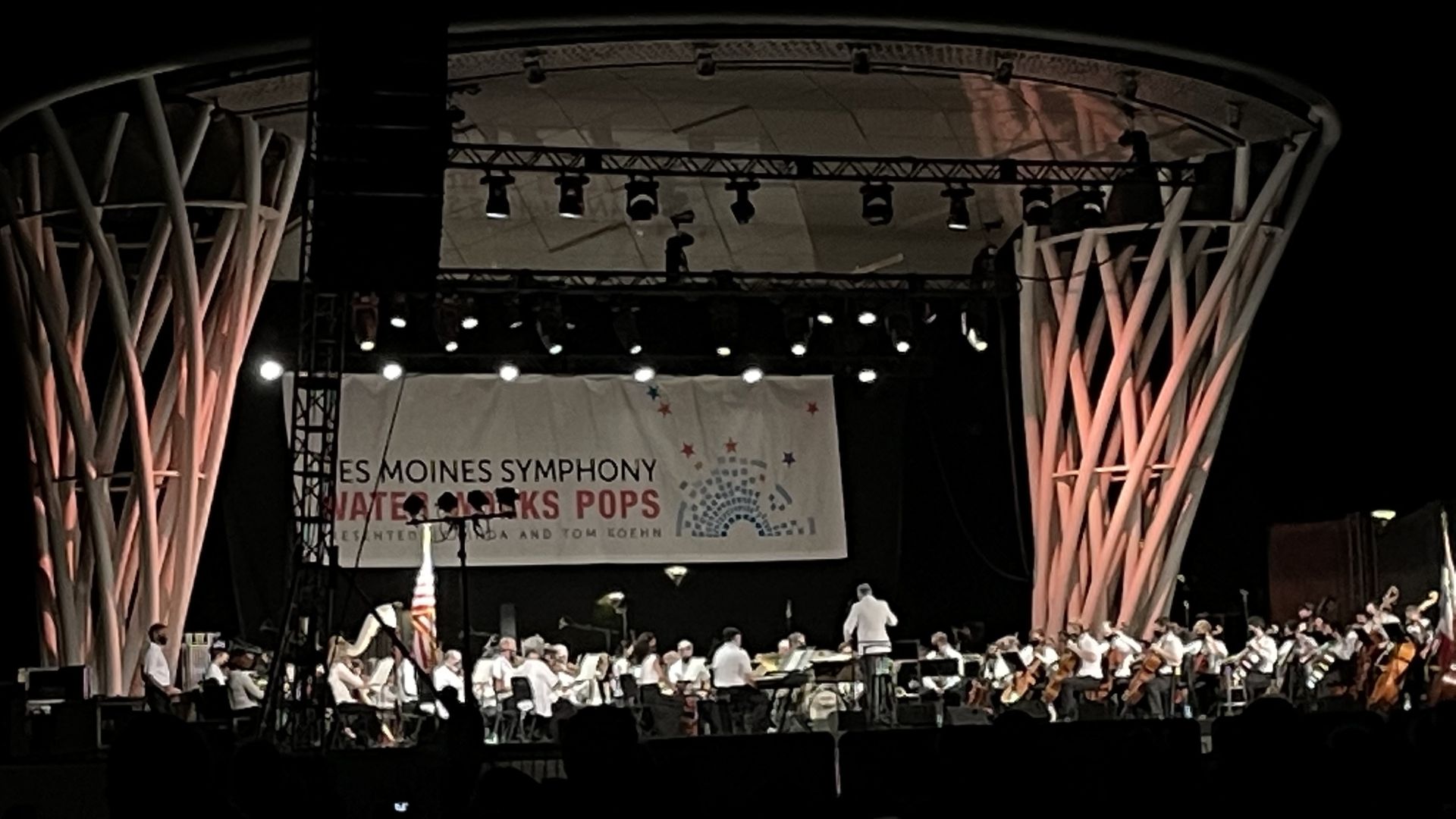 A photo of the Des Moines Symphony playing at Water Works Park.