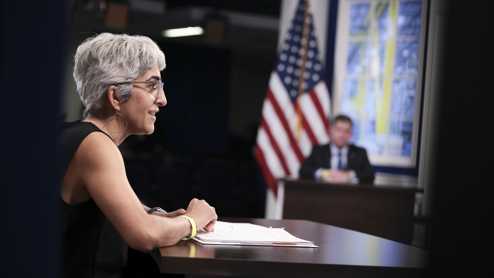 Photo of Kiran Ahuja speaking at a meeting