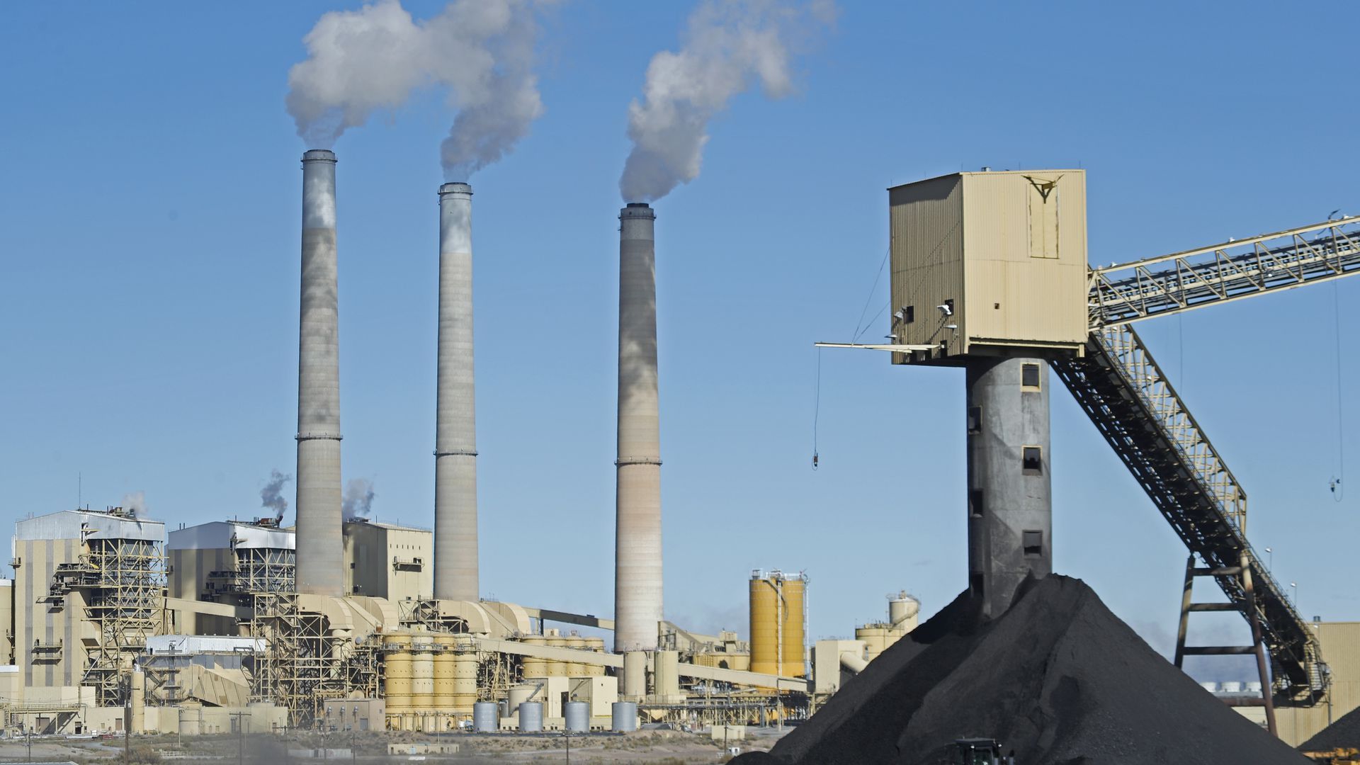 A truck delivers coal to Pacificorp's 1440 megawatt coal-fired power plant in Castle Dale, Utah.