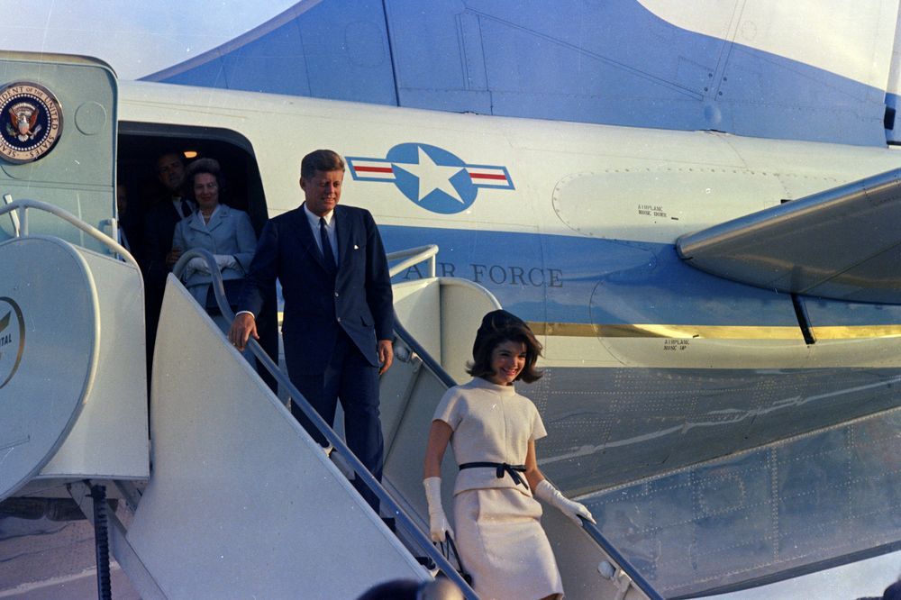 President John F. Kennedy and First Lady Jacqueline Kennedy exit Air Force One upon their arrival at Houston International Airport in Houston.