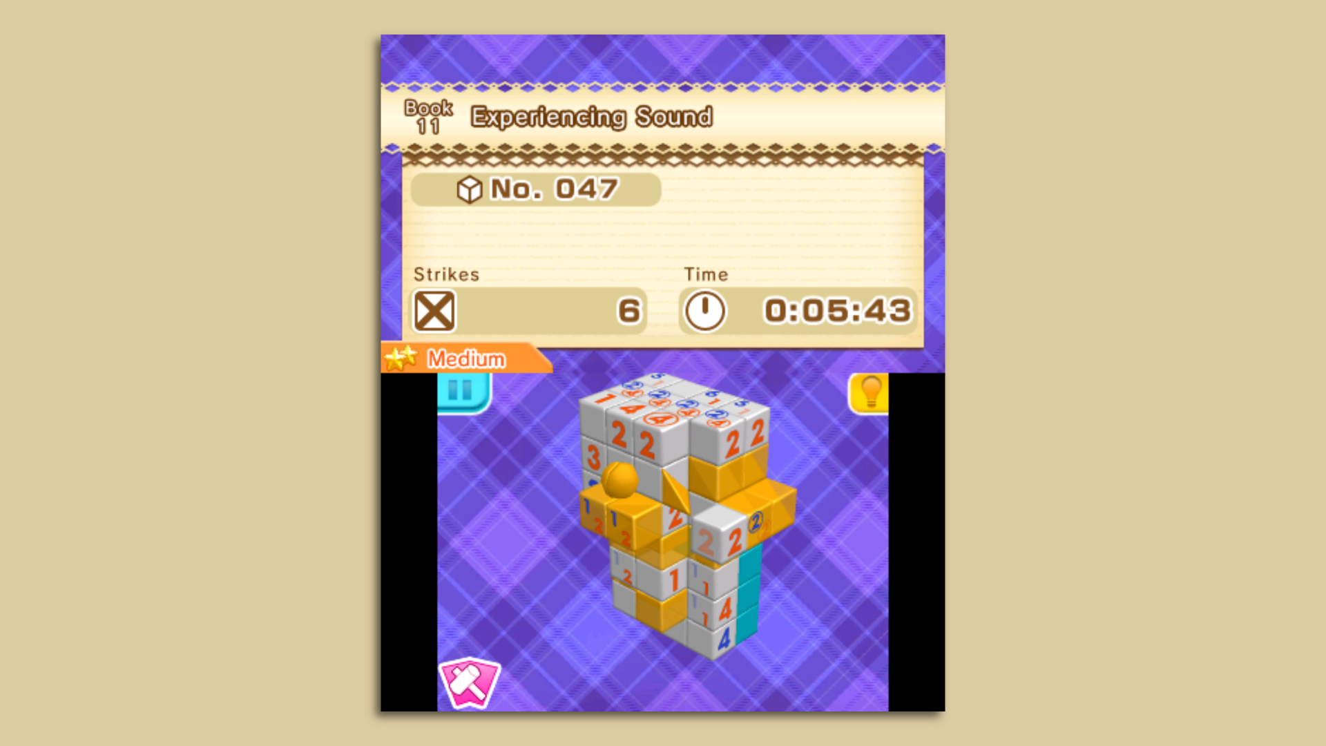 Video game screenshot of a cluster of blocks with numbers on them.