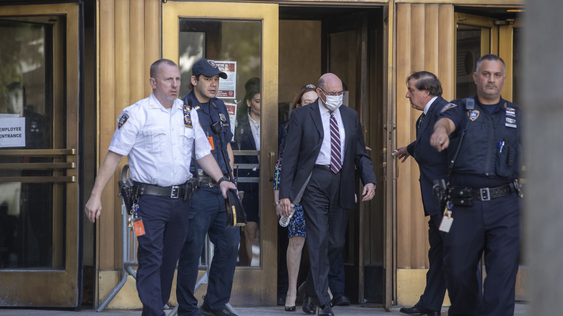 Allen Weisselberg, former chief financial officer of Trump Organization Inc., center, departs from criminal court in New York, US, on Friday, Aug. 12, 2022.