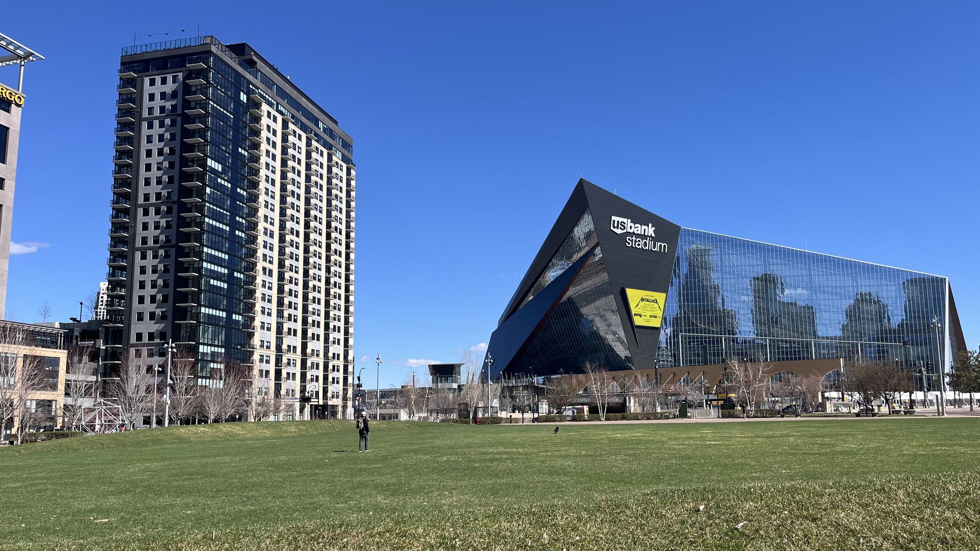 A tower on the left, next to US Bank Stadium 