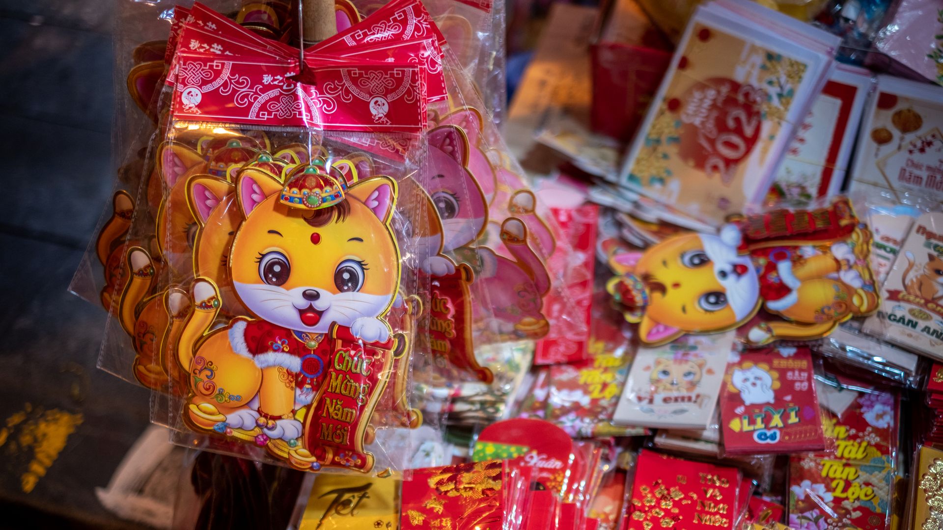 Stickers with cat image are on display at the Spring Festival Fair in the Old Quarter on January 14, 2023 in Hanoi, Vietnam