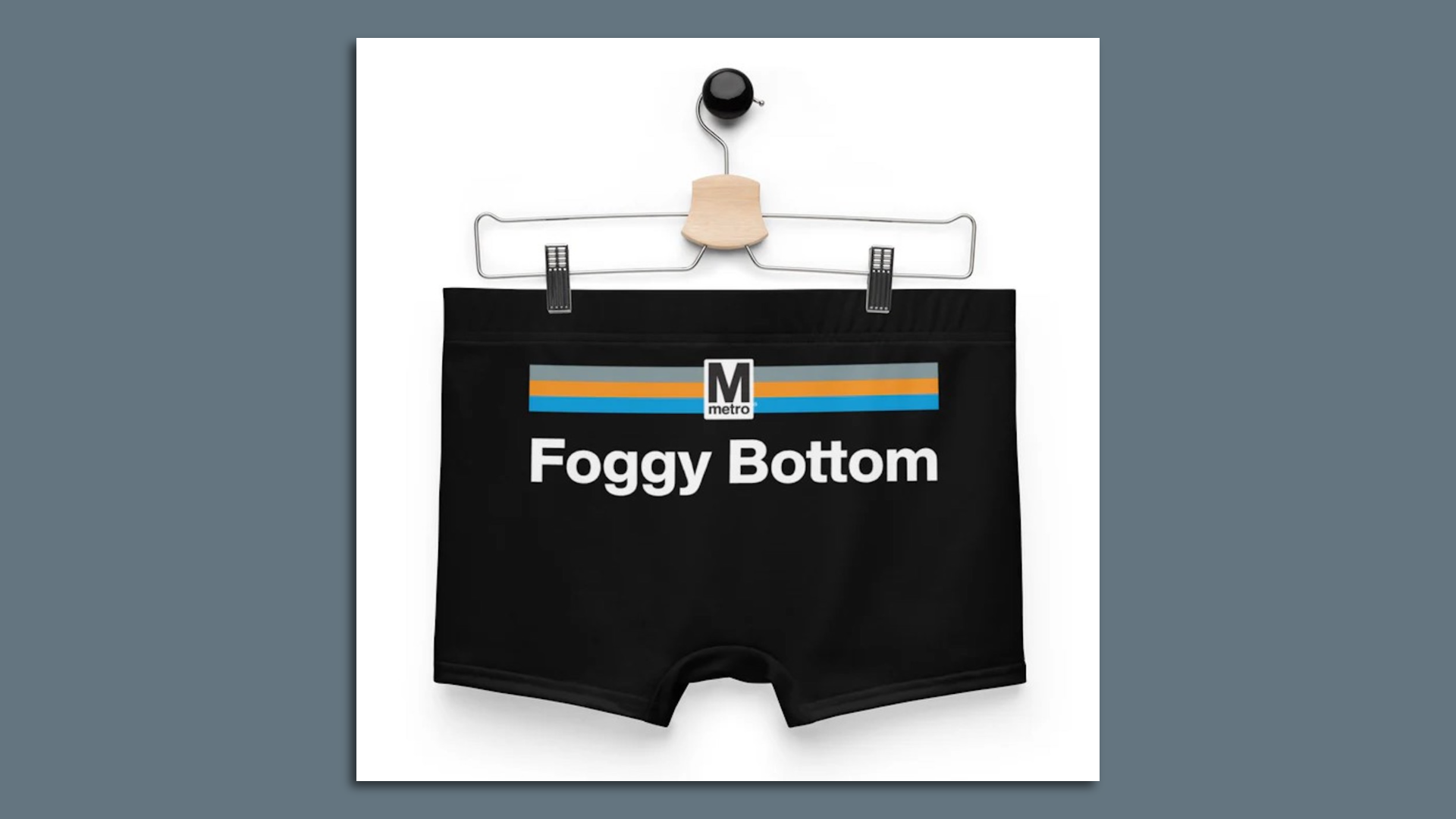 Black swim trunks with "Foggy Bottom" on the back