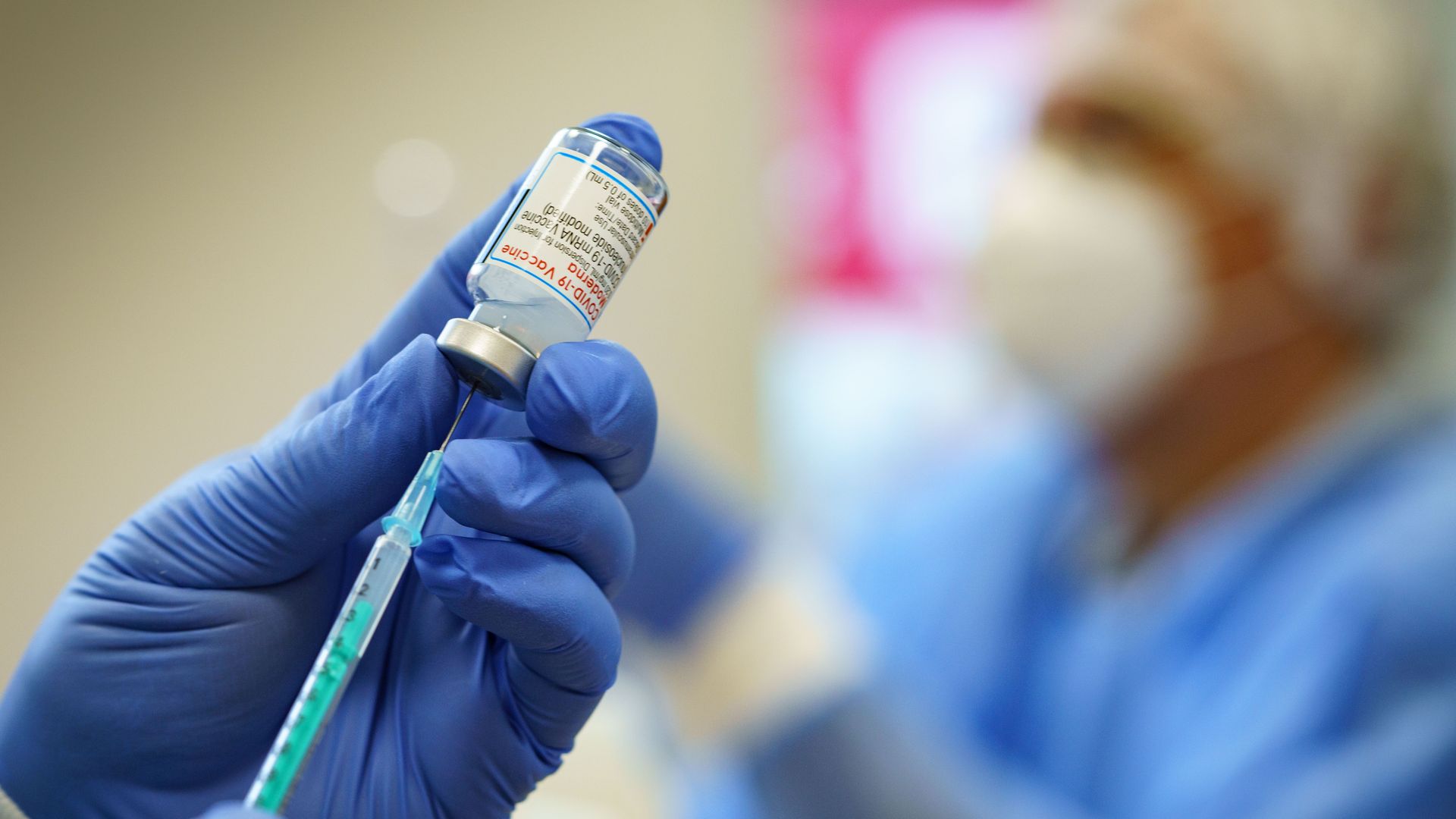 A health care worker preparing a dose of Moderna's coronavirus vaccine in Germany on December.