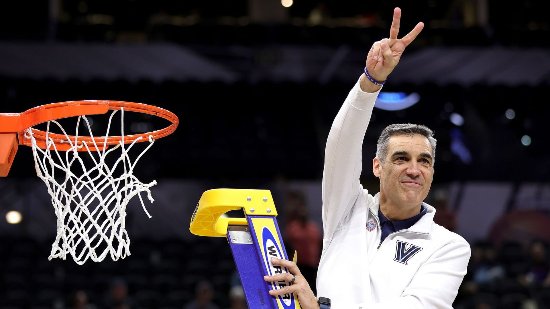 Jay Wright cuts down the net after beating Houston in the Elite Eight last month.