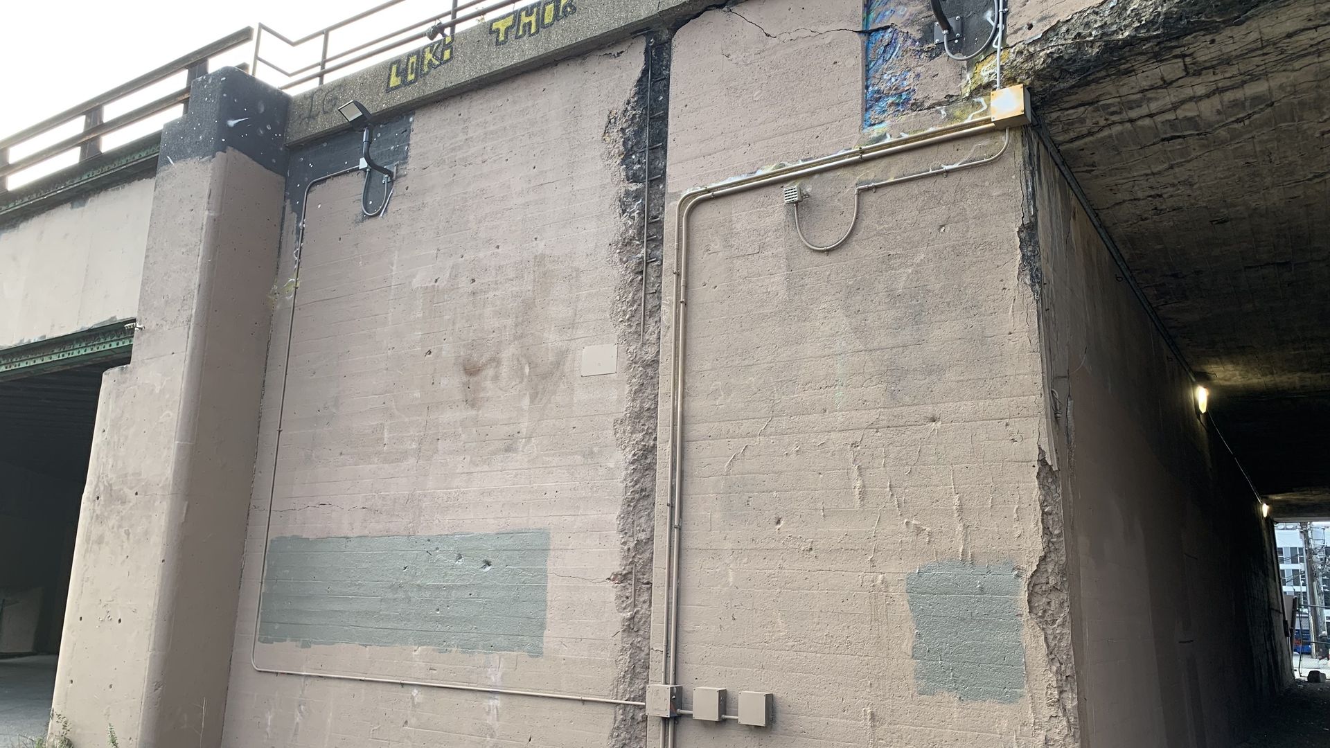 The former site of the Juice WRLD mural that has now been painted over with brown paint in Chicago's West Loop.