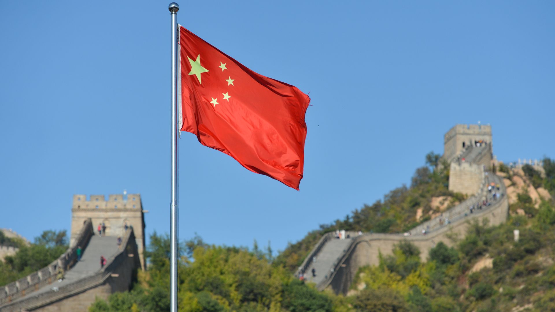 The Chinese National Flag is photographed in front of Badaling, the most visited section of the Great Wall of China