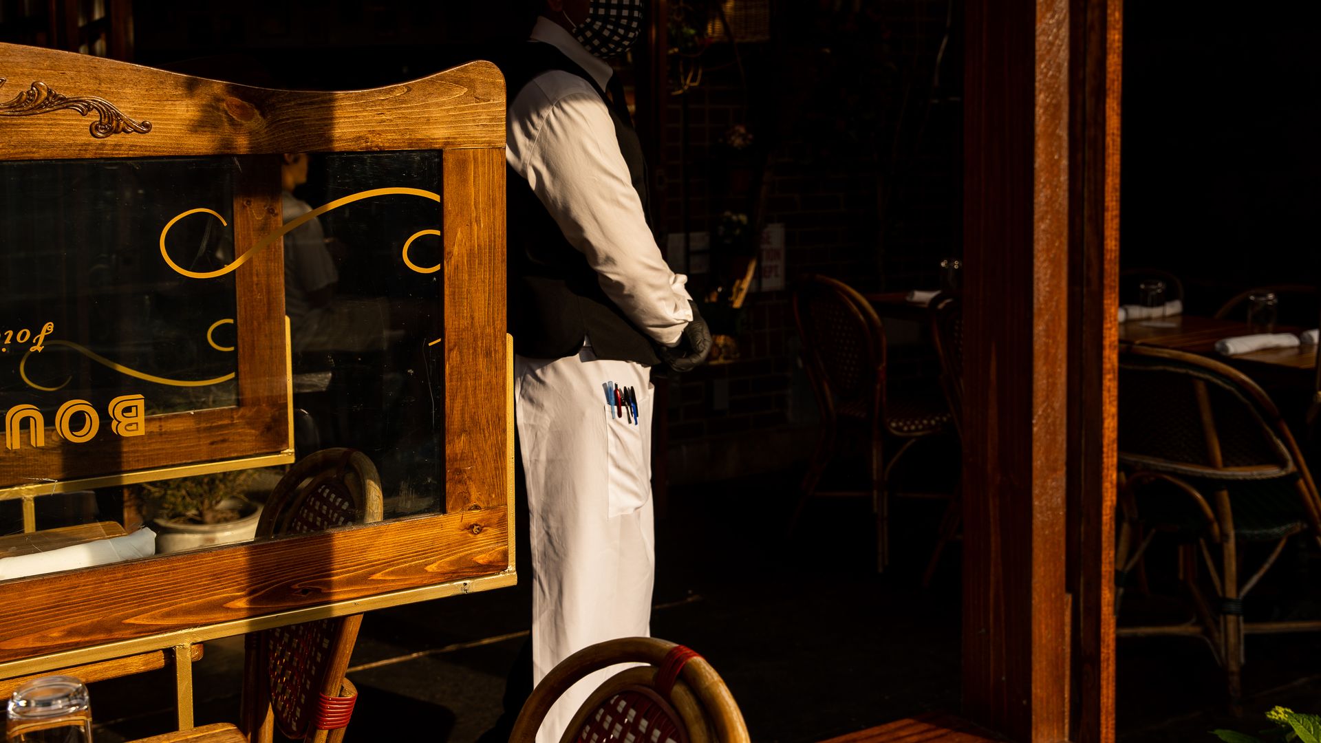A waiter at a restaurant in Manhattan
