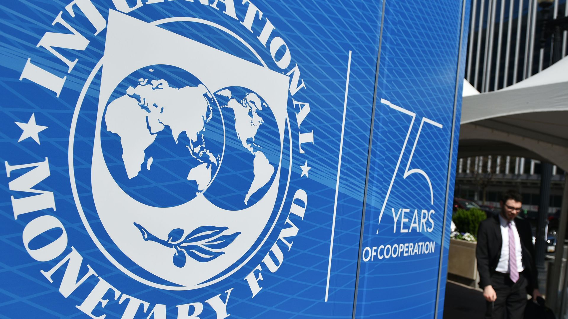 The seal of the International Monetary Fund(IMF) is seen outside of the headquarters building in Washington, DC on April 8, 2019.