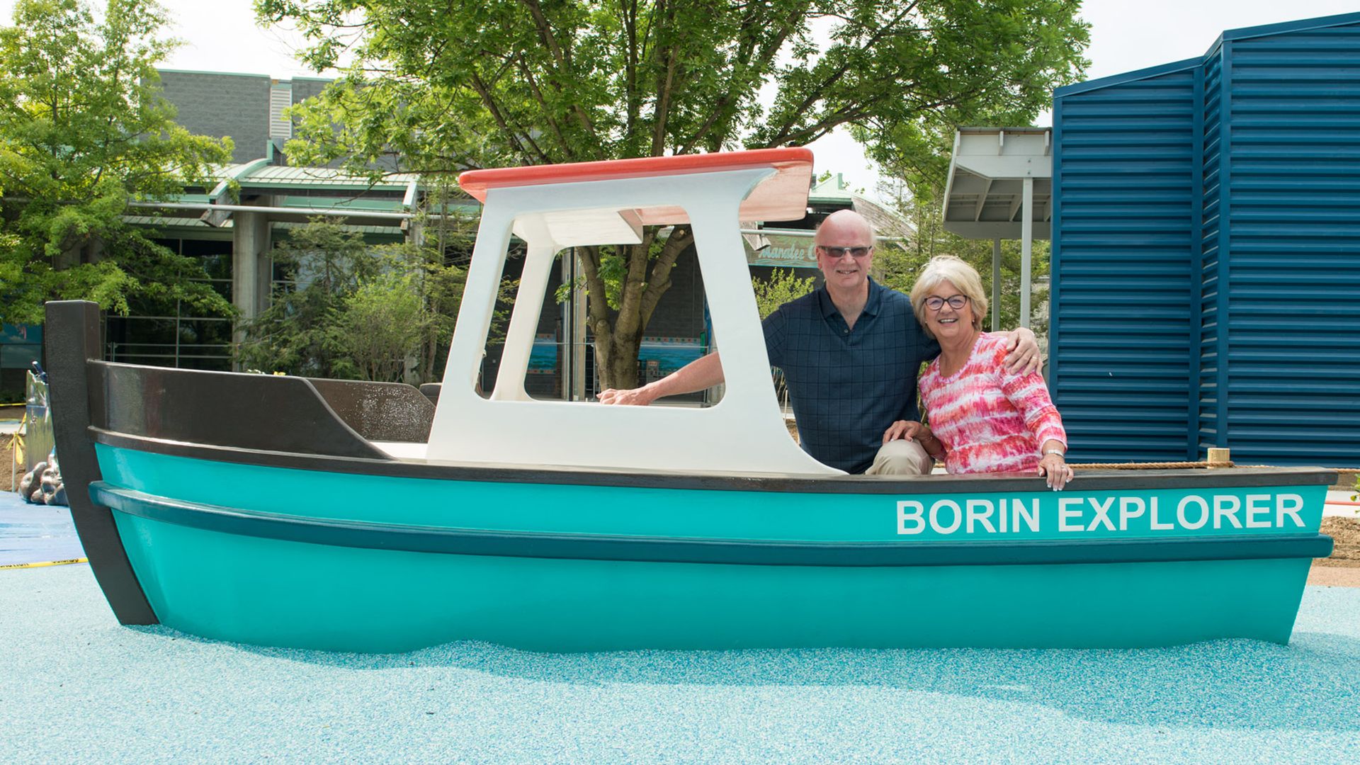 Columbus Zoo director emeritus Jerry Borin and his wife Lois, sit in a tugboat in a zoo play area named after him