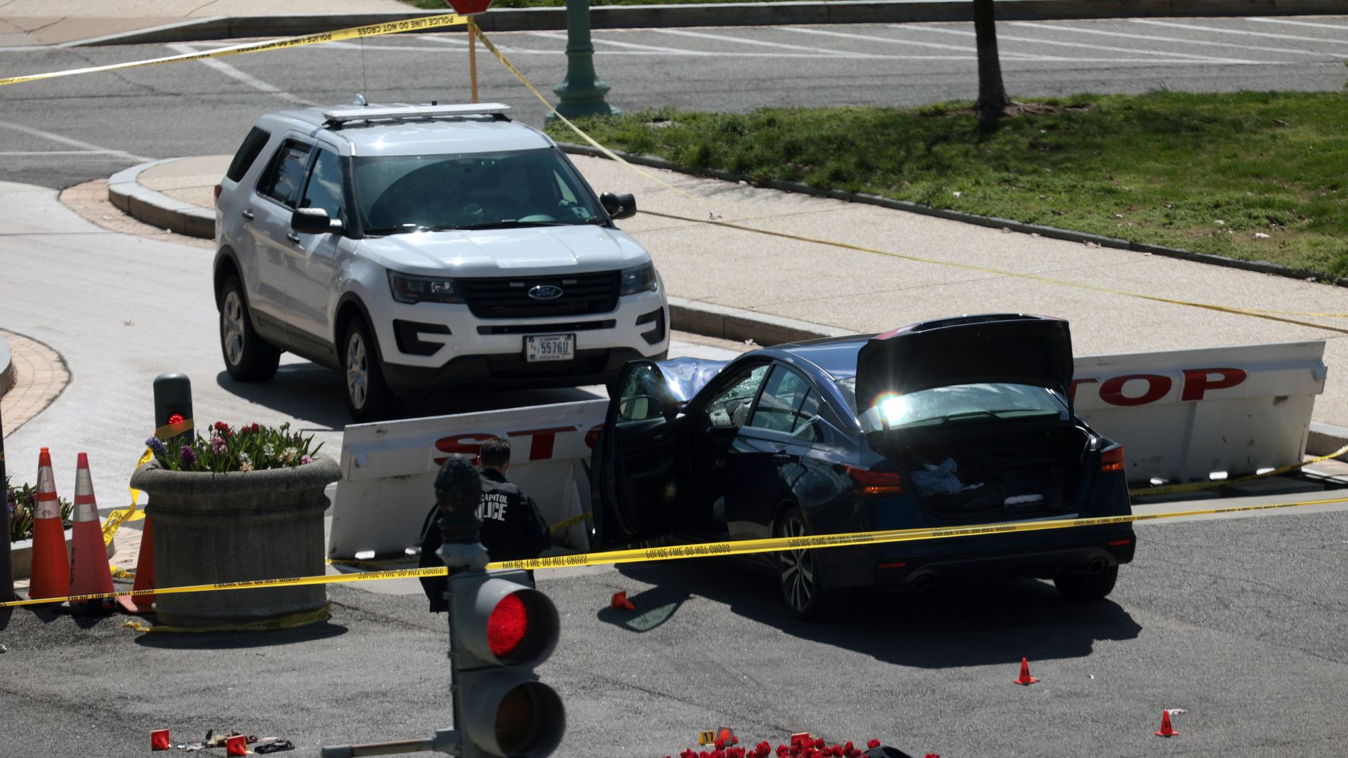 Police investigating the scene where a driver rammed a vehicle into two police officers at the U.S. Capitol on April 02.