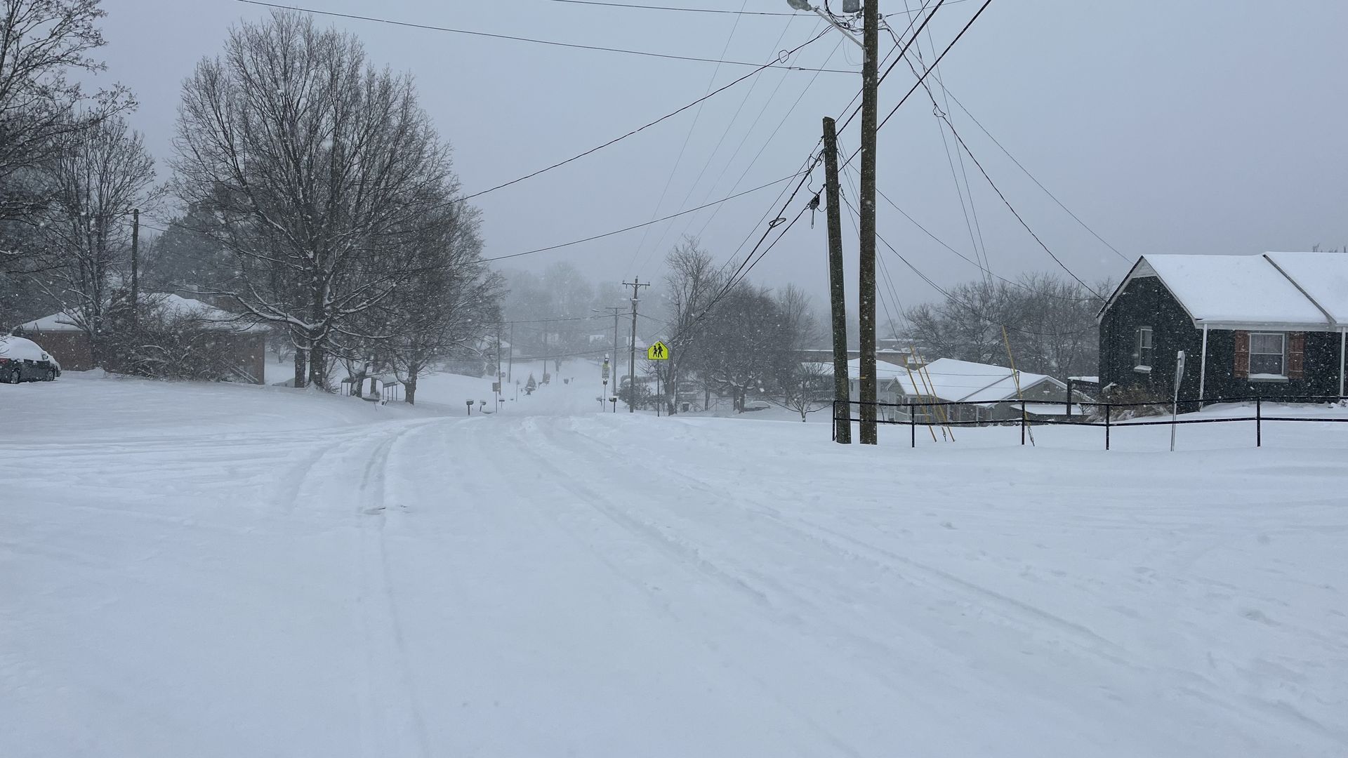 A road covered in snow.