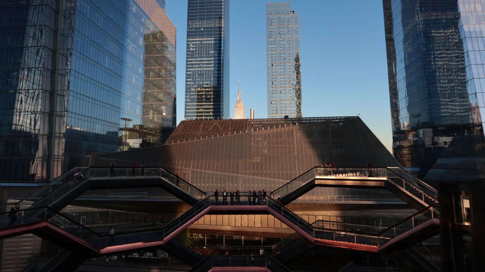 In this image, the geometric staircase of Hudson Yards is visible outside the building 