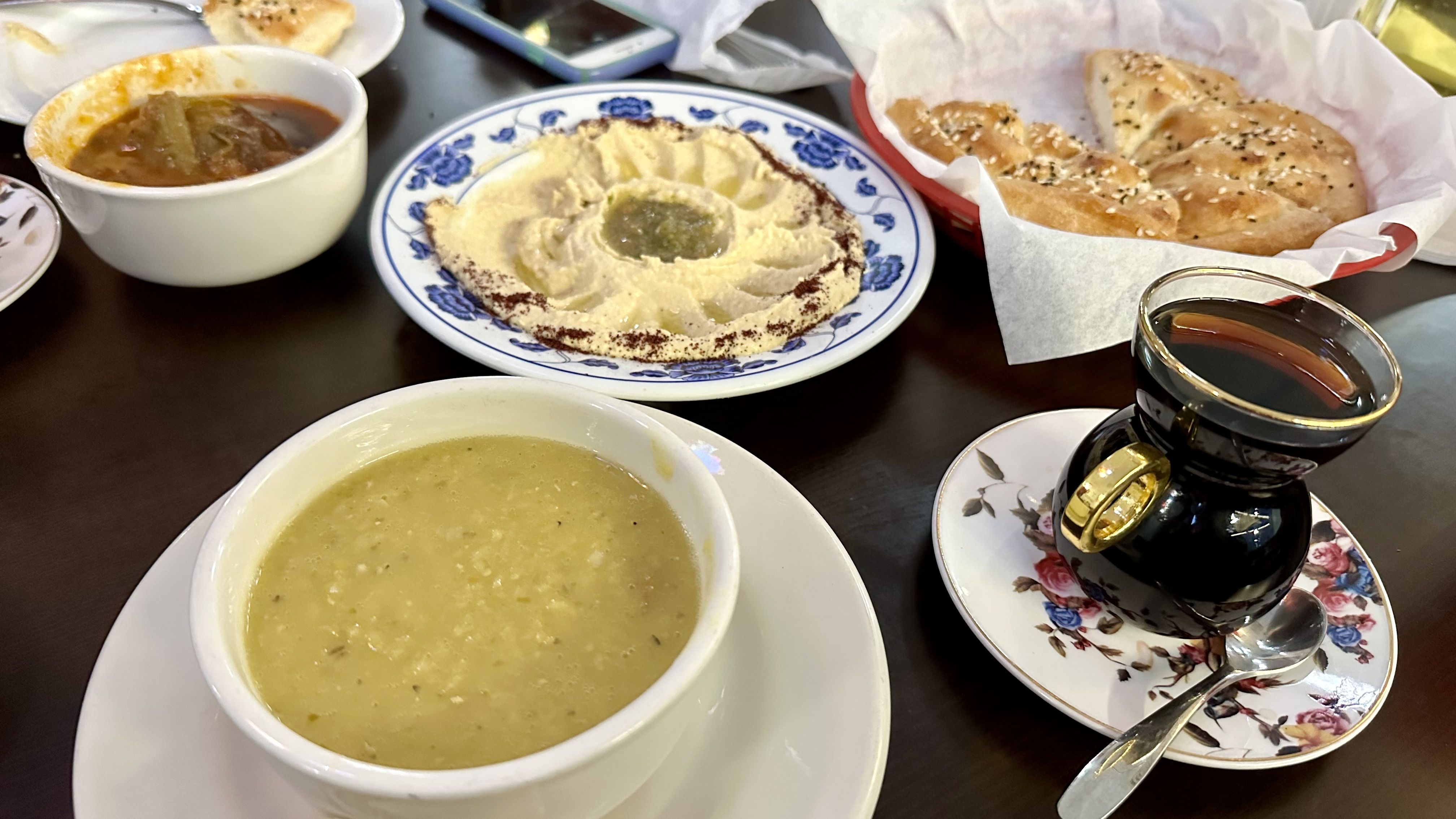 Photo shows the lentil soup, hummus and tea at Almasgoof