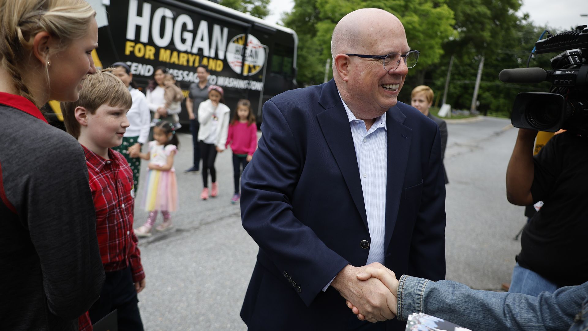 Larry Hogan, Republican candidate for U.S. Senate in Maryland, greets supporters before casting his ballot in the state primary election at Davidsonville Elementary School on May 14, 2024 in Davidsonville, Maryland.