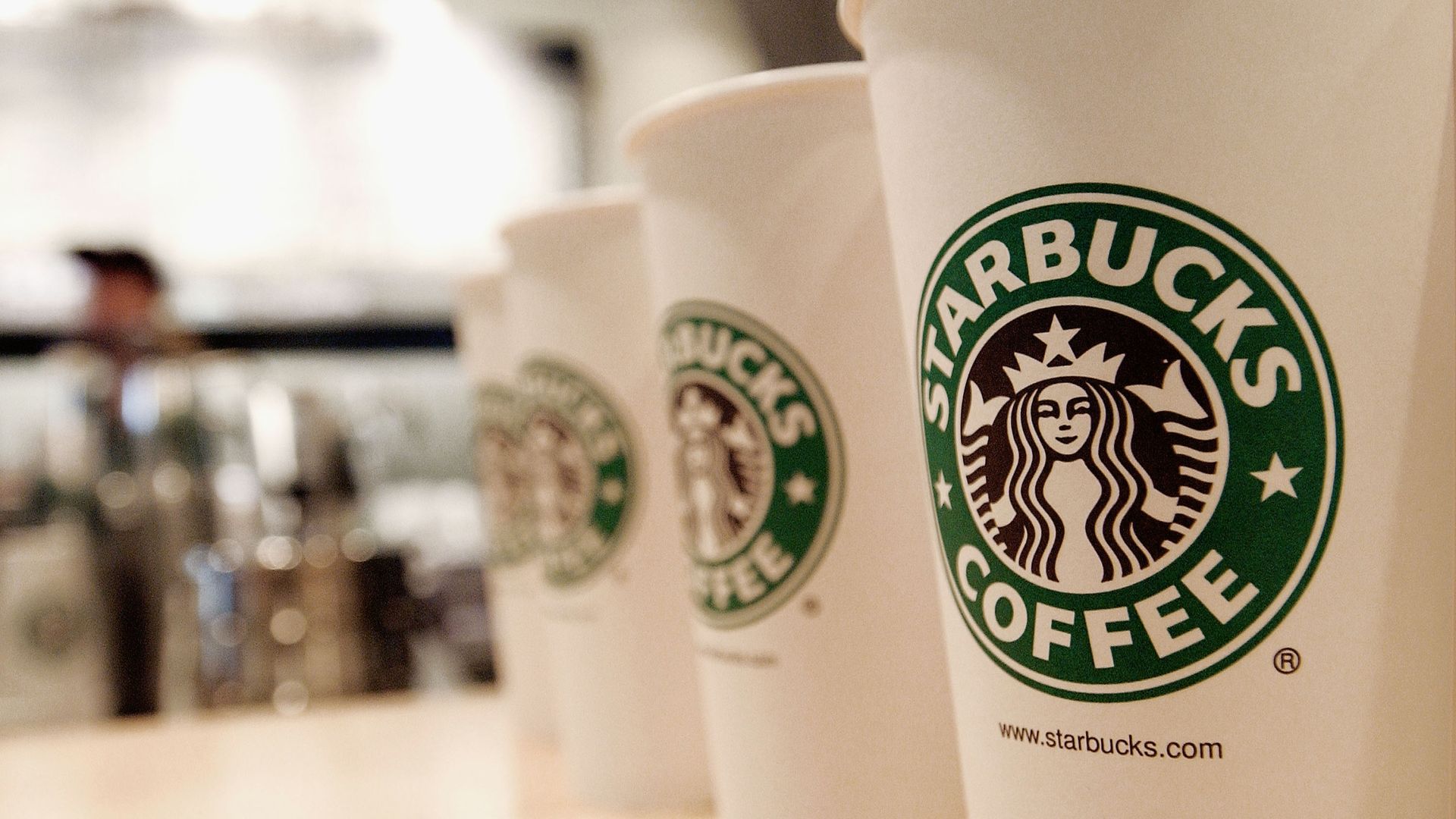 Starbucks cups with company logo