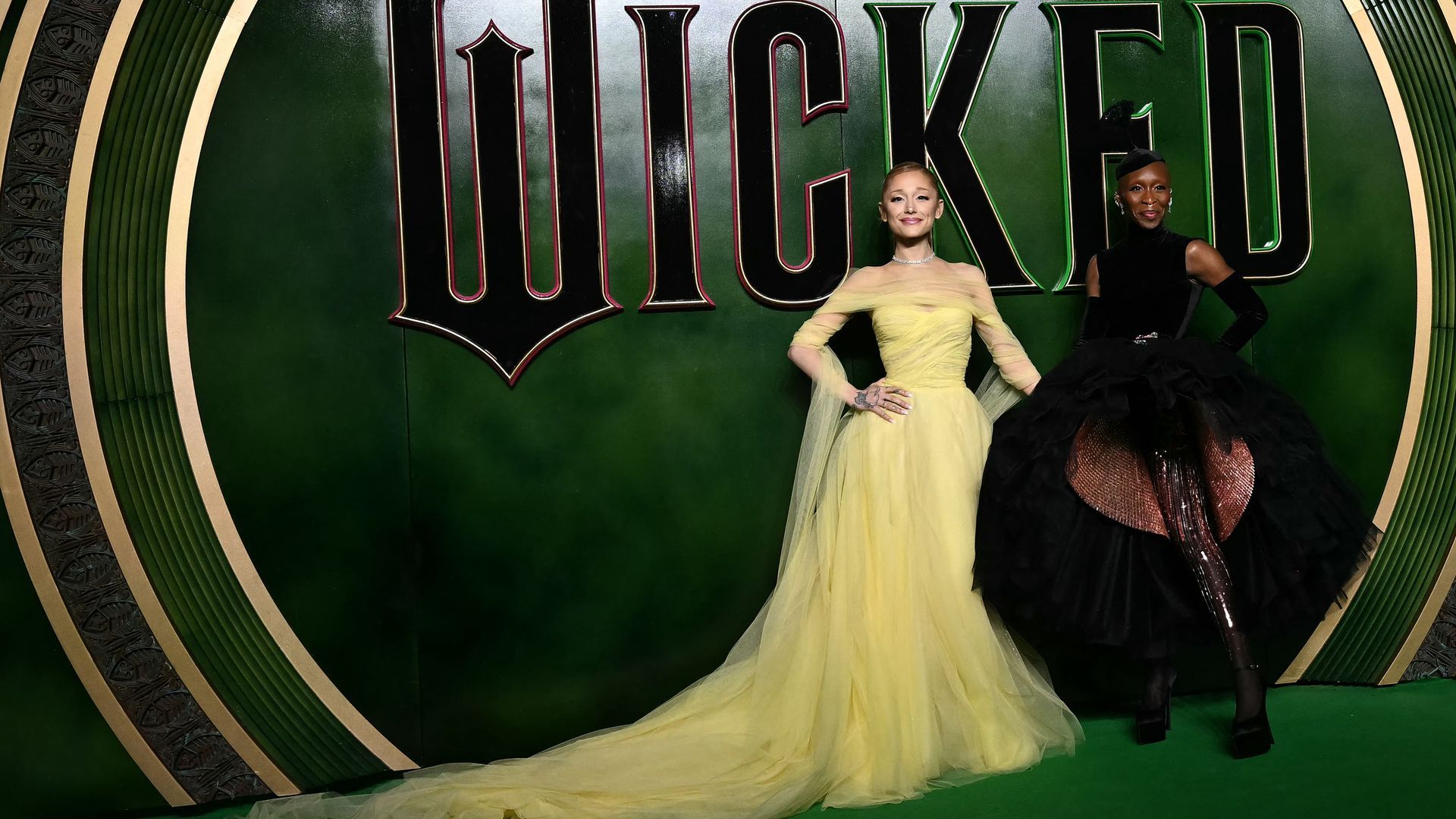 Ariana Grande (L) and Cynthia Erivo (R) pose upon arrival for the European Premiere of the film "Wicked" at the Royal Festival Hall in central London on Nov. 18.